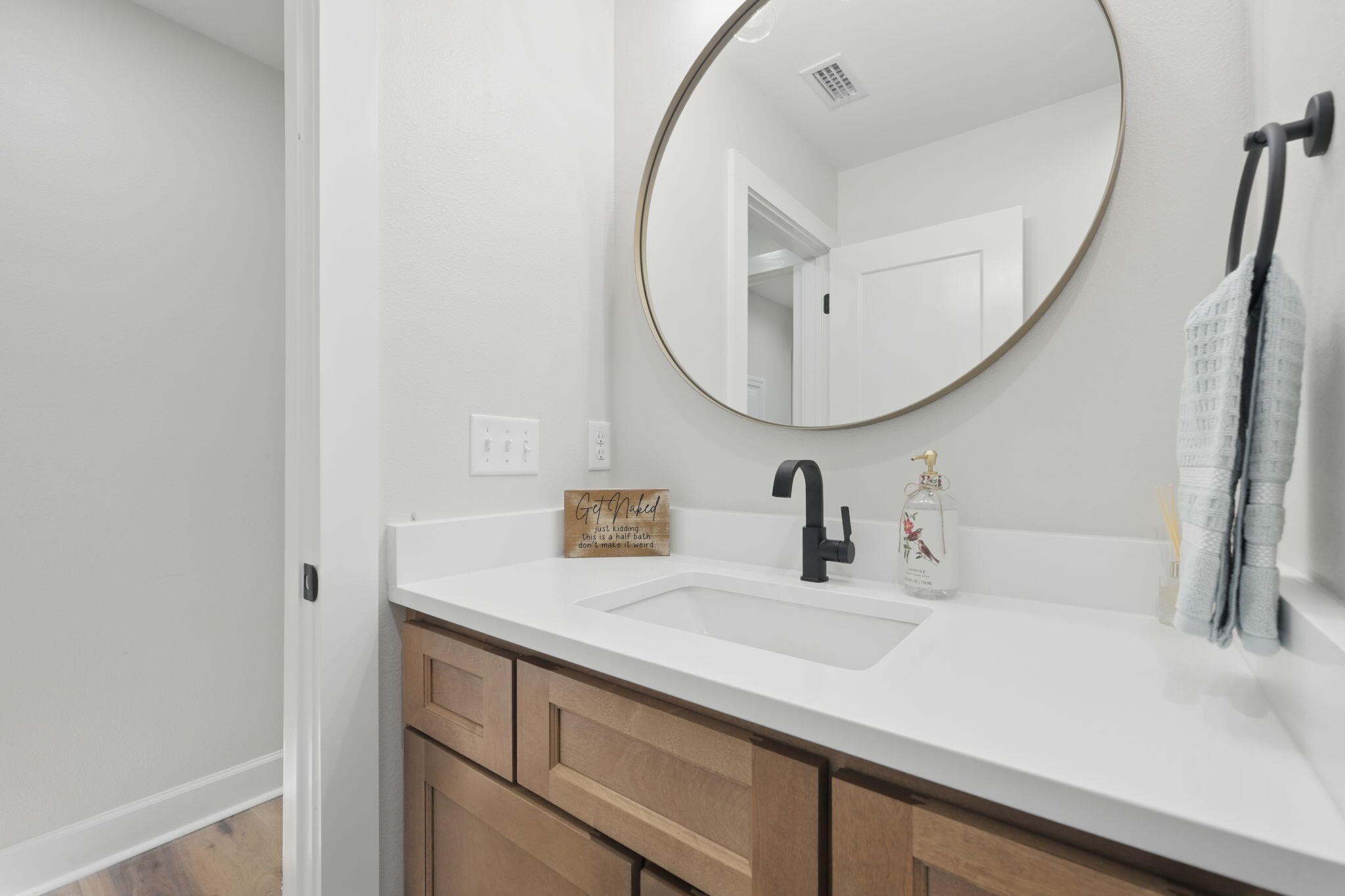 134 Deer Valley Road DeFuniak Springs, FL 32433 - Photo 61 of 82 a bathroom with a sink and a mirror