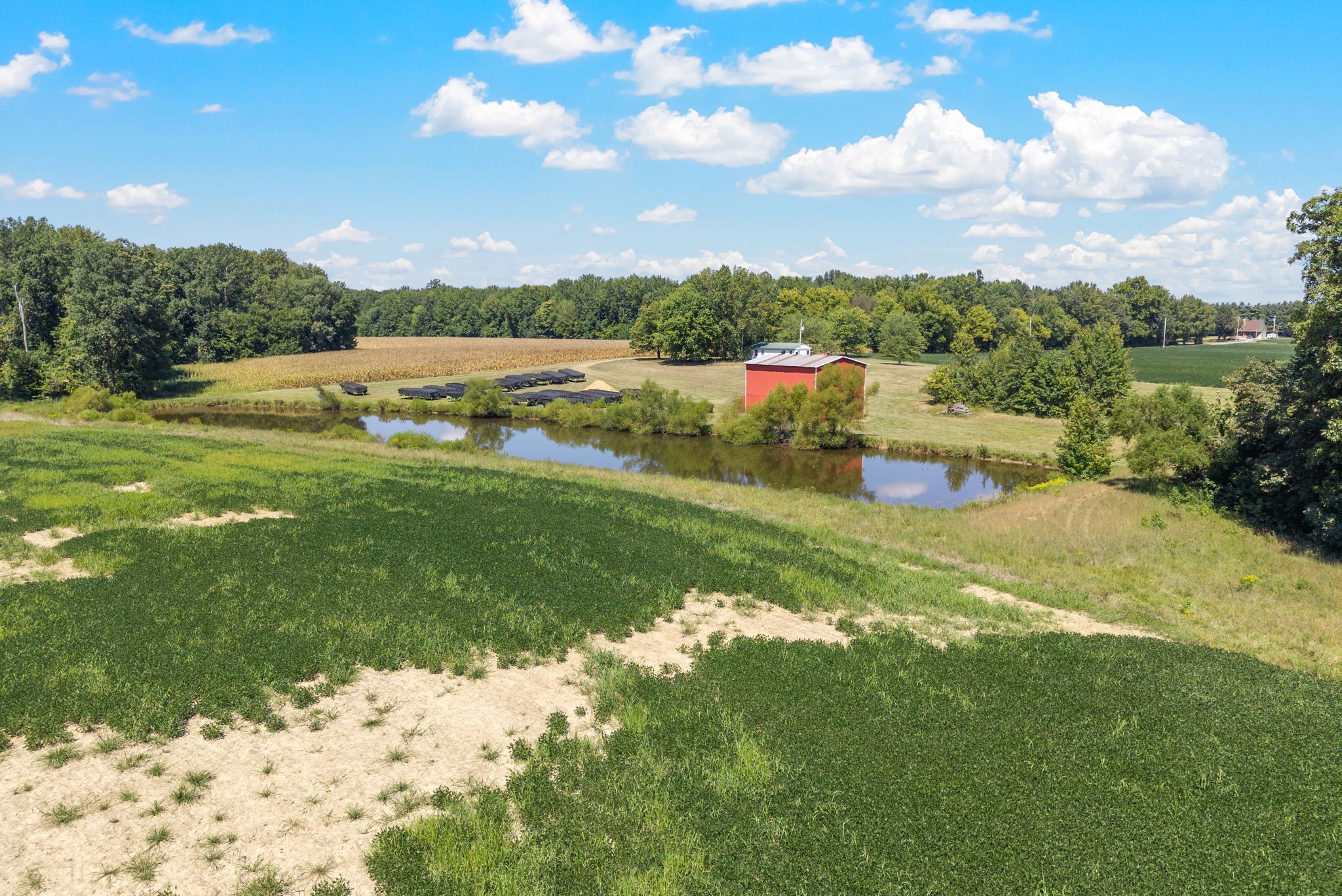 8127 Pleasant Hill Road Cross Plains, TN 37049 - Photo 18 of 24 a view of a lake with a house in the background