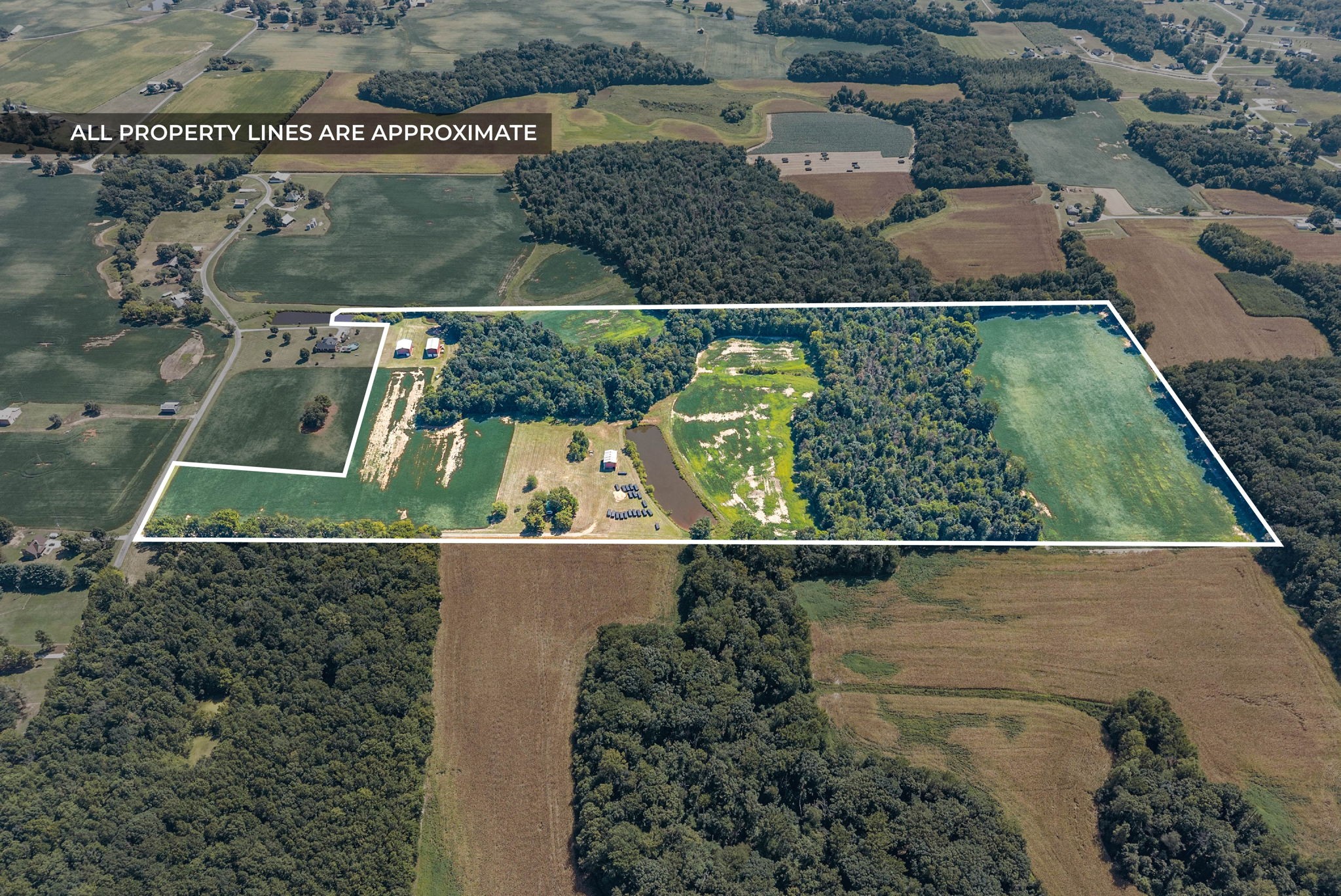 8127 Pleasant Hill Road Cross Plains, TN 37049 - Photo 2 of 24 an aerial view of a residential houses with outdoor space