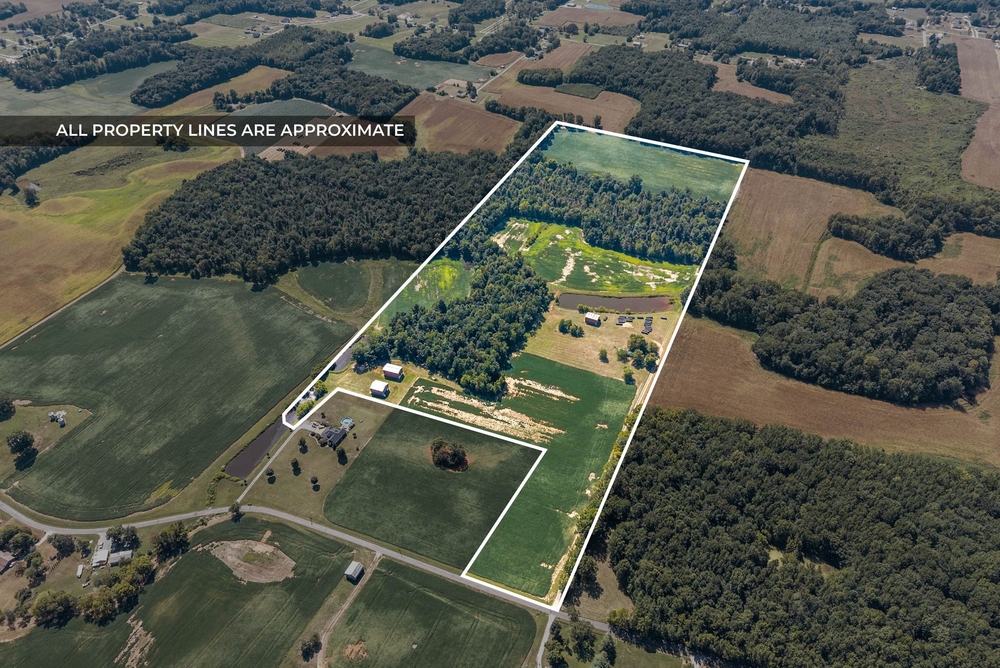 8127 Pleasant Hill Road Cross Plains, TN 37049 - Photo 3 of 24 an aerial view of a residential houses with outdoor space