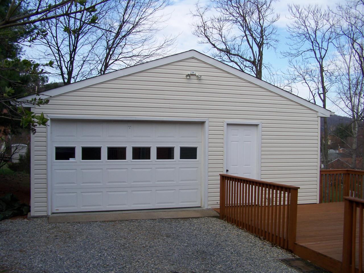 717 Kenyon Road Vinton, VA 24179 - Photo 3 of 16 a view of a house with a yard and large tree