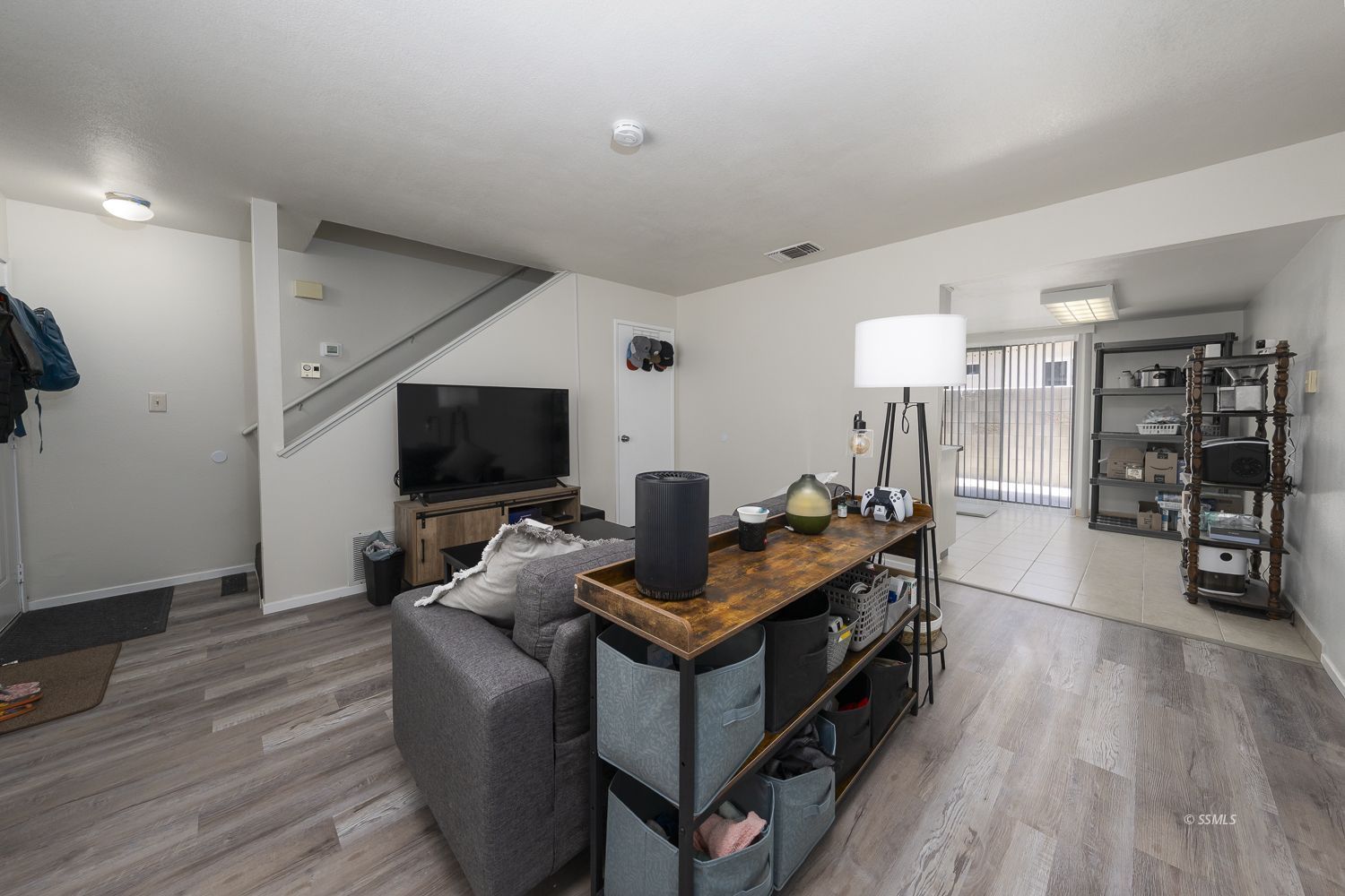 149 South Lilac Street Ridgecrest, CA 93555 - Photo 5 of 25 a living room with furniture and a flat screen tv