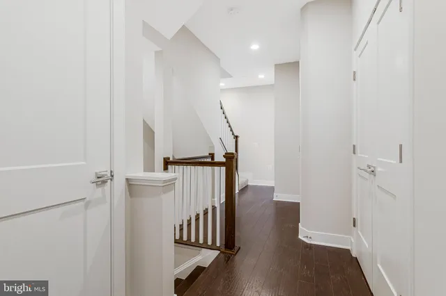 a view of entryway with wooden floor