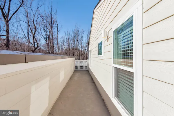 a view of hallway with windows