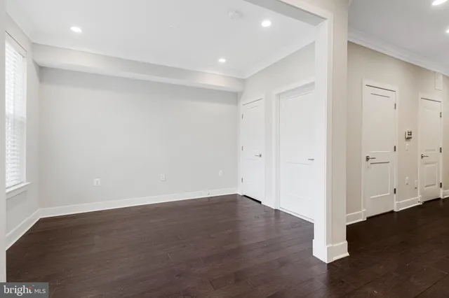 a view of entryway with wooden floor
