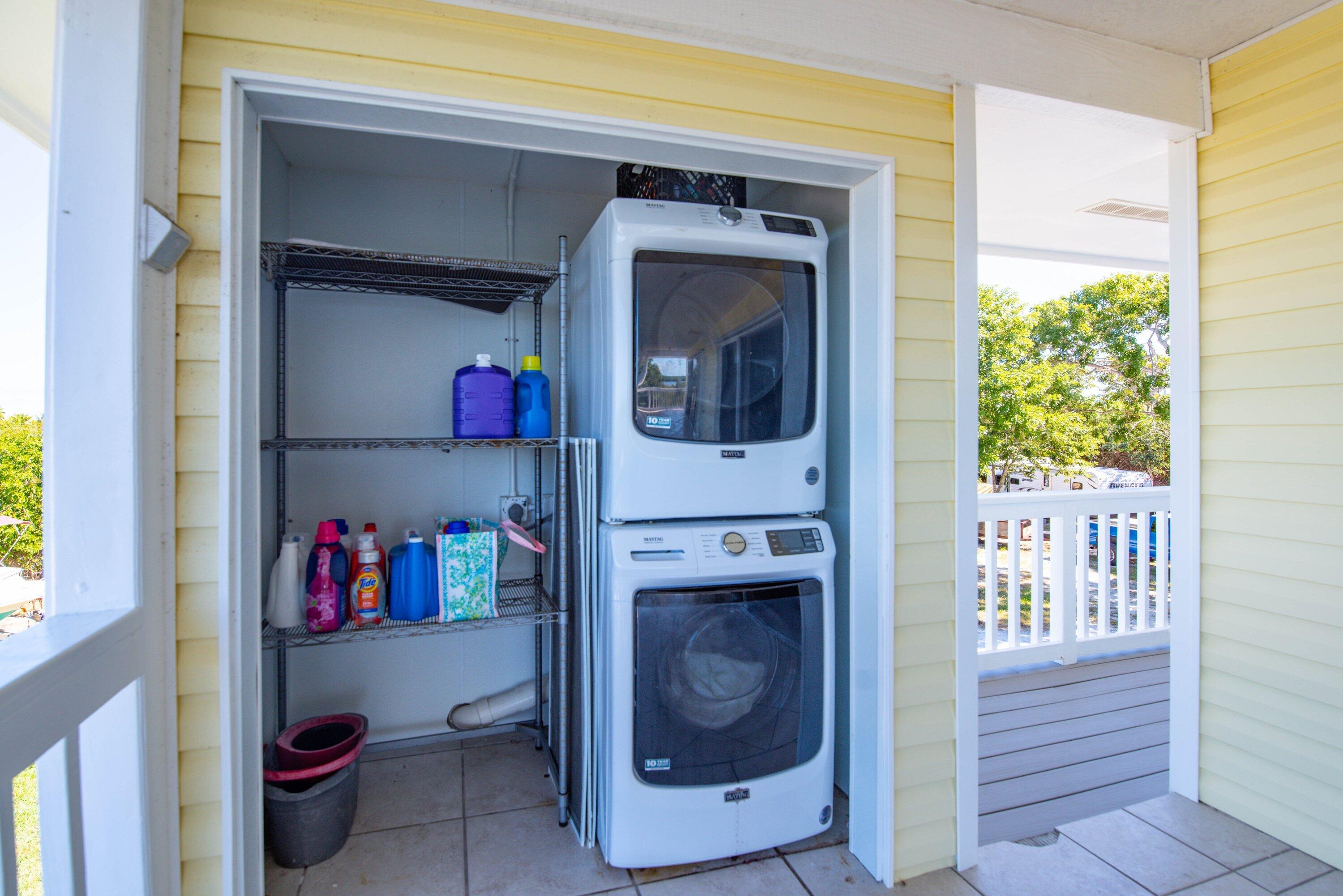 27821 Leeward S Road Summerland Key, FL 33042 - Photo 18 of 32 a utility room with dryer and washer