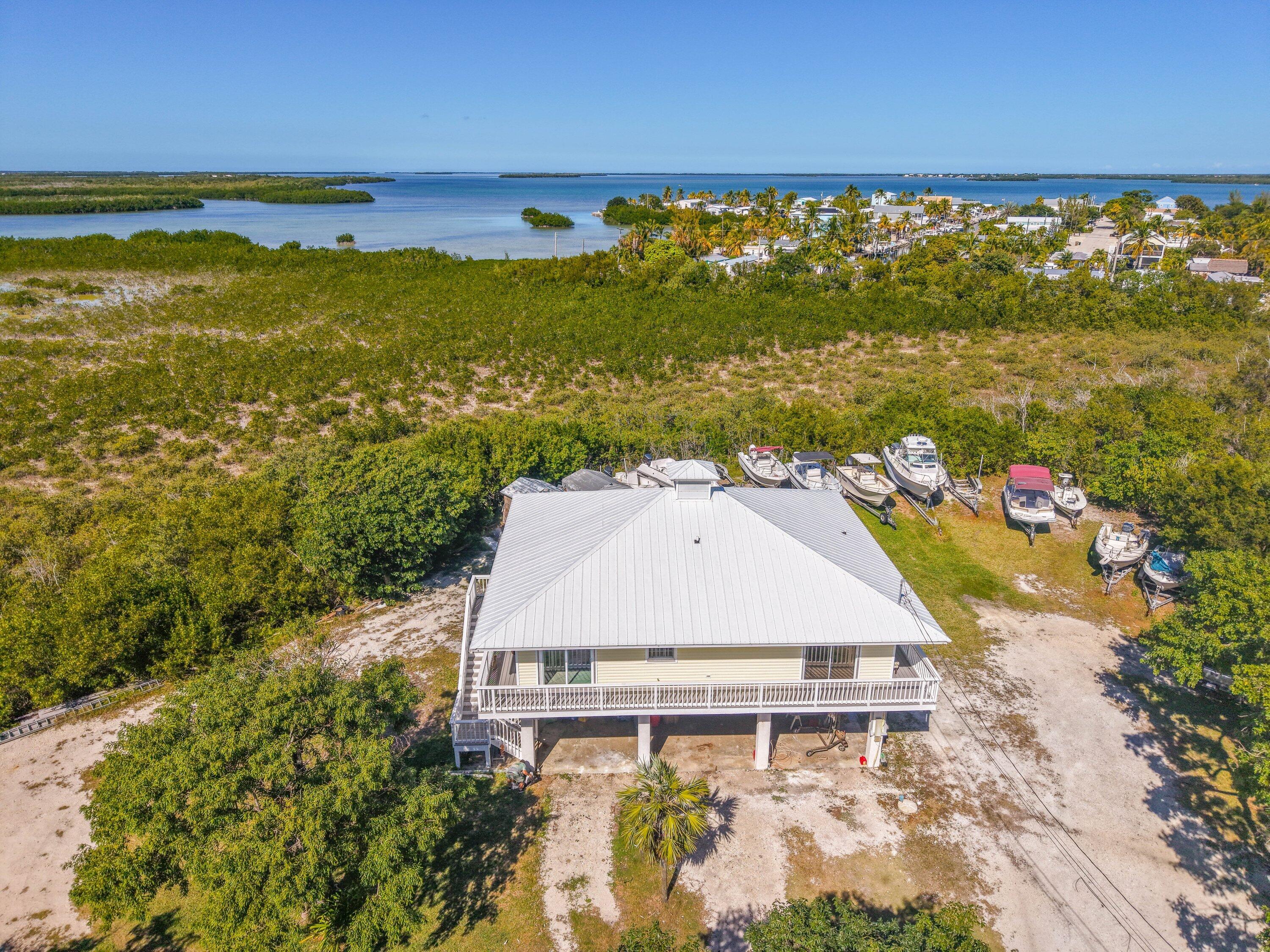 27821 Leeward S Road Summerland Key, FL 33042 - Photo 22 of 32 a aerial view of a house with a ocean view