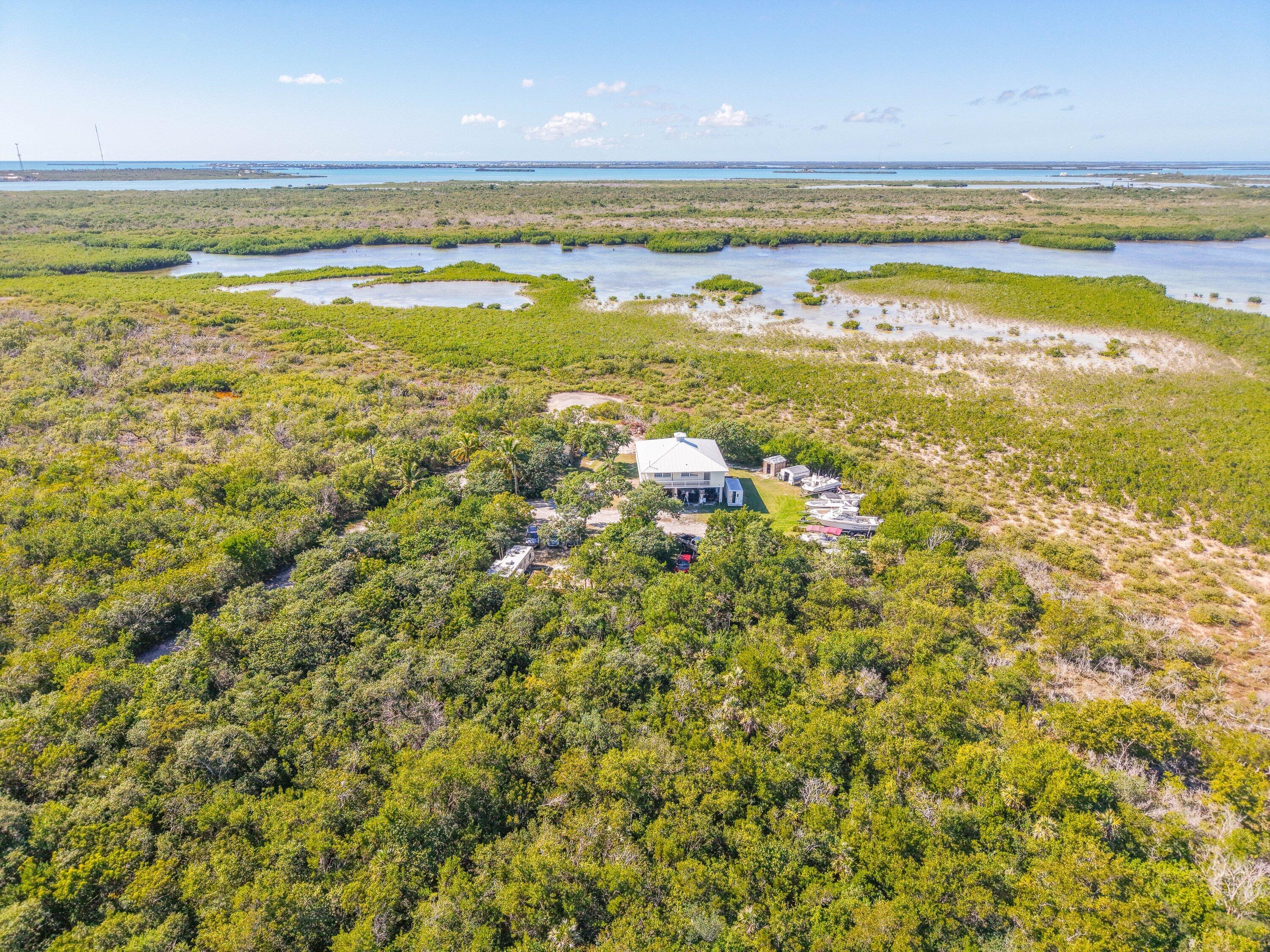 27821 Leeward S Road Summerland Key, FL 33042 - Photo 25 of 32 a view of an ocean and beach