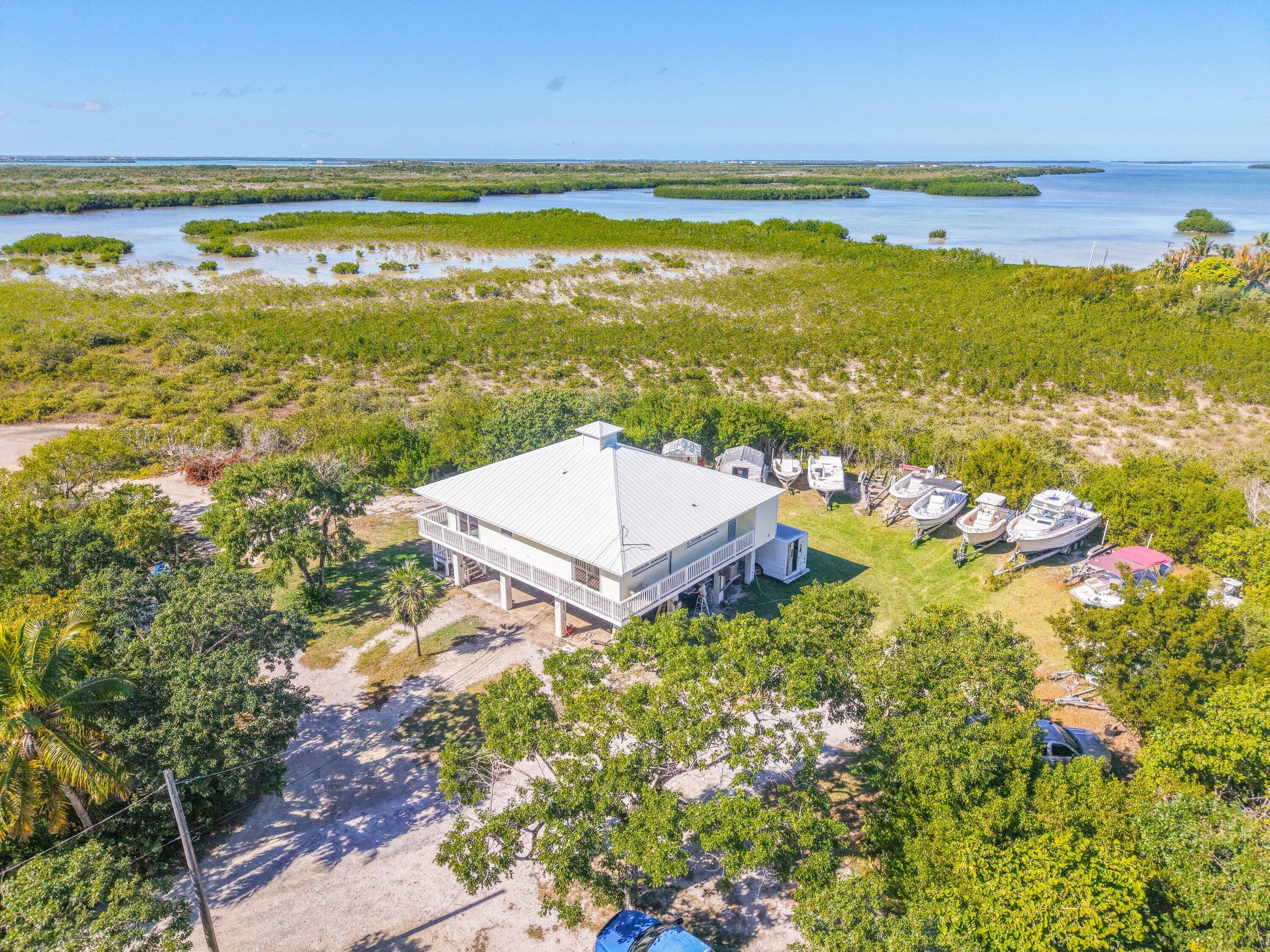 27821 Leeward S Road Summerland Key, FL 33042 - Photo 26 of 32 a view of an ocean and beach