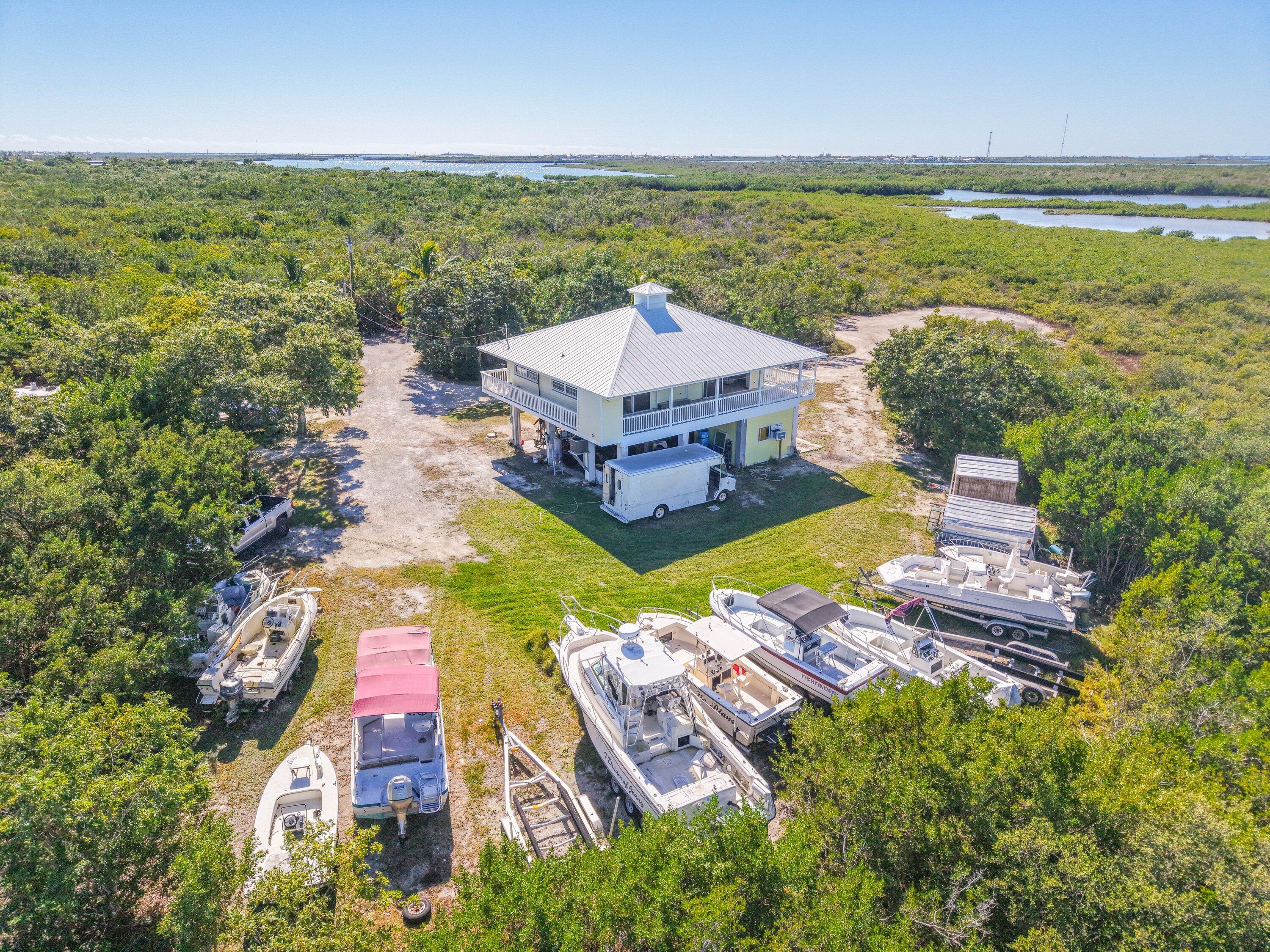 27821 Leeward S Road Summerland Key, FL 33042 - Photo 31 of 32 an aerial view of a house with a ocean view