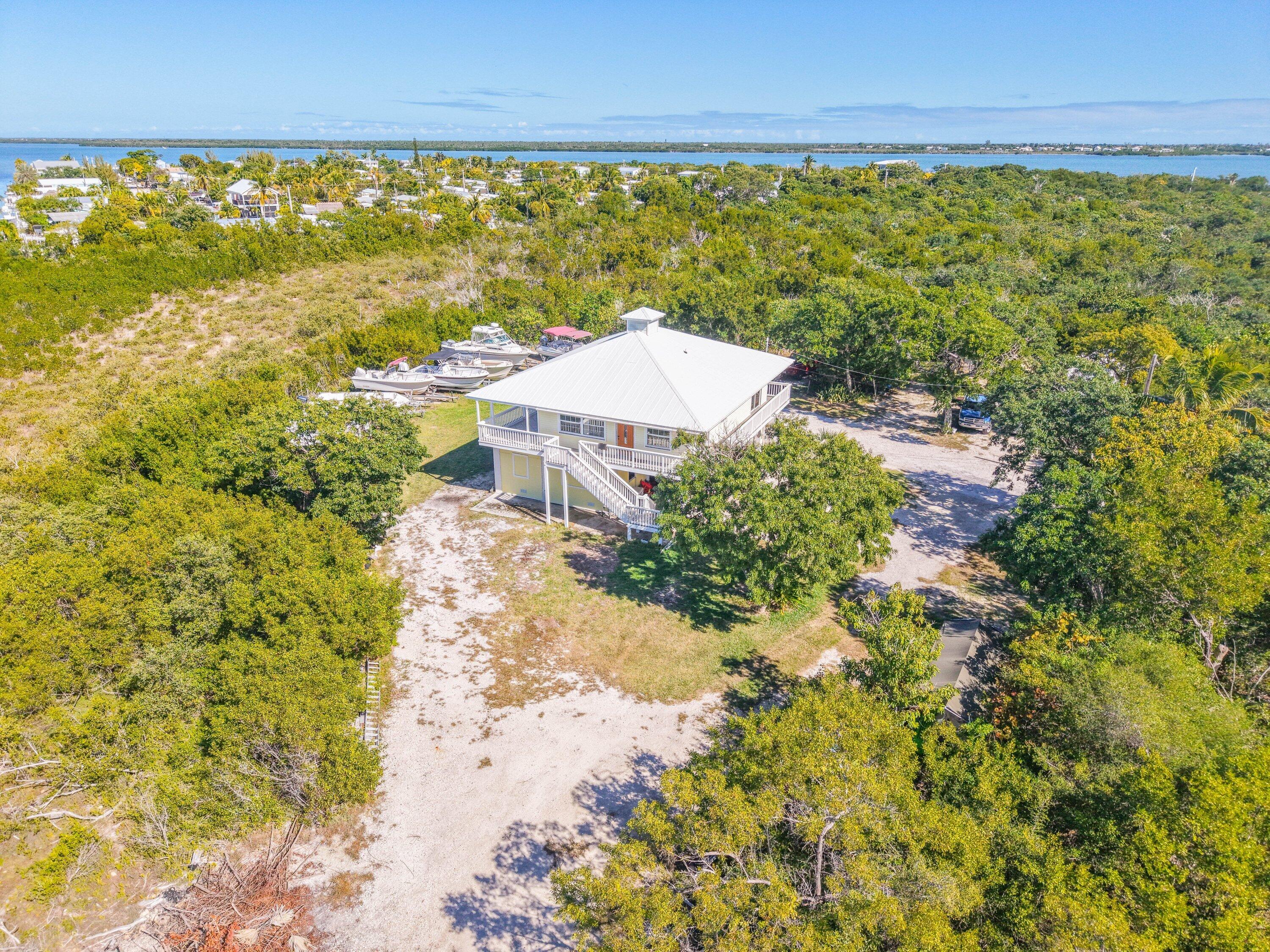 27821 Leeward S Road Summerland Key, FL 33042 - Photo 32 of 32 a view of an outdoor space and a yard