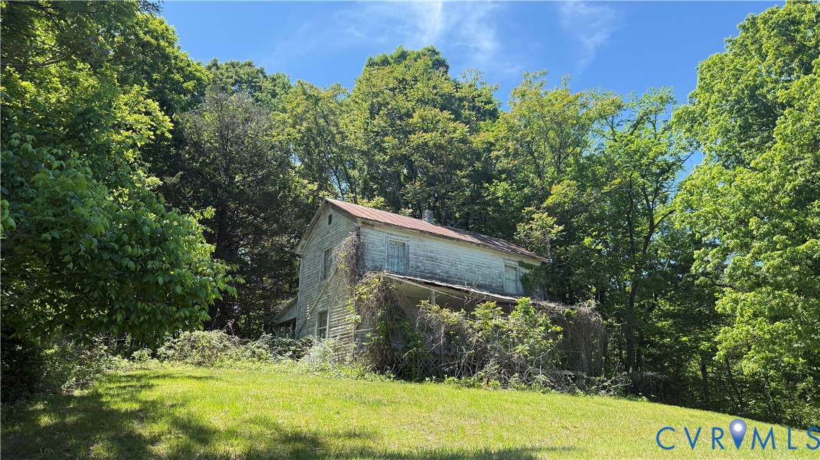 62 Full House Road Eagle Rock, VA 24085 - Photo 1 of 9 a backyard of a house with lots of green space