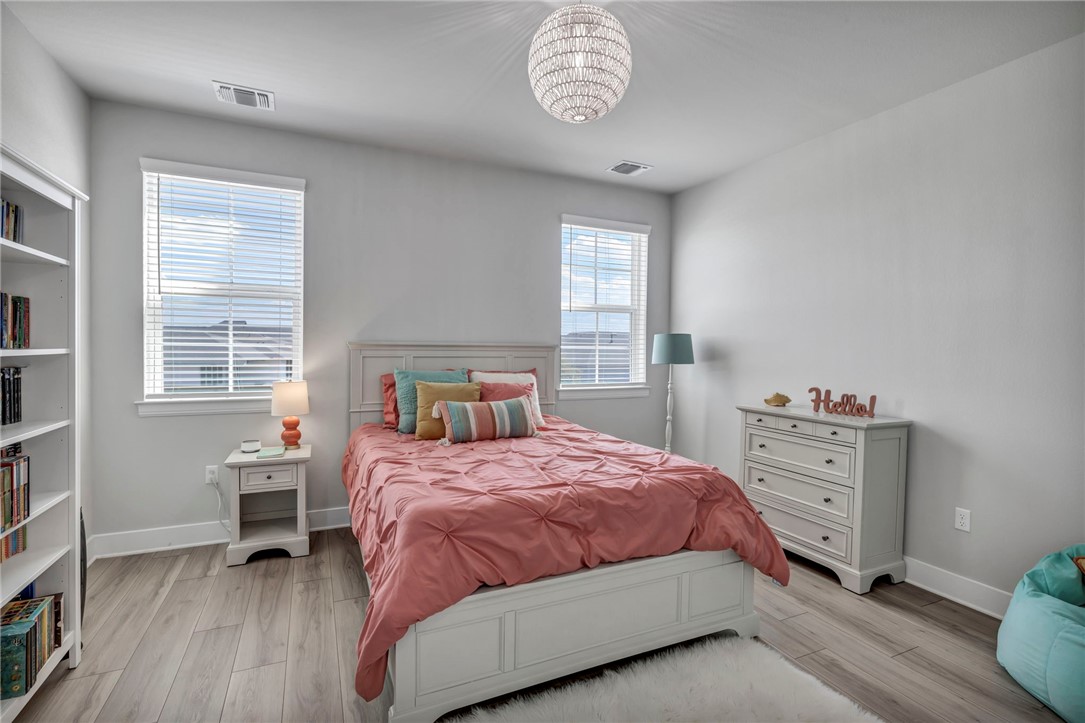 7808 Chrysler Bend Austin, TX 78744 - Photo 29 of 35 4th bedroom is a roomy retreat that could be used as a guest bedroom, bonus room, 2nd office, studio or playroom.