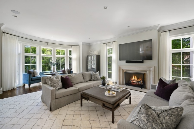 956 Sunset Road Winnetka, IL 60093 - Photo 22 of 71 a living room with furniture a rug a window and a fireplace