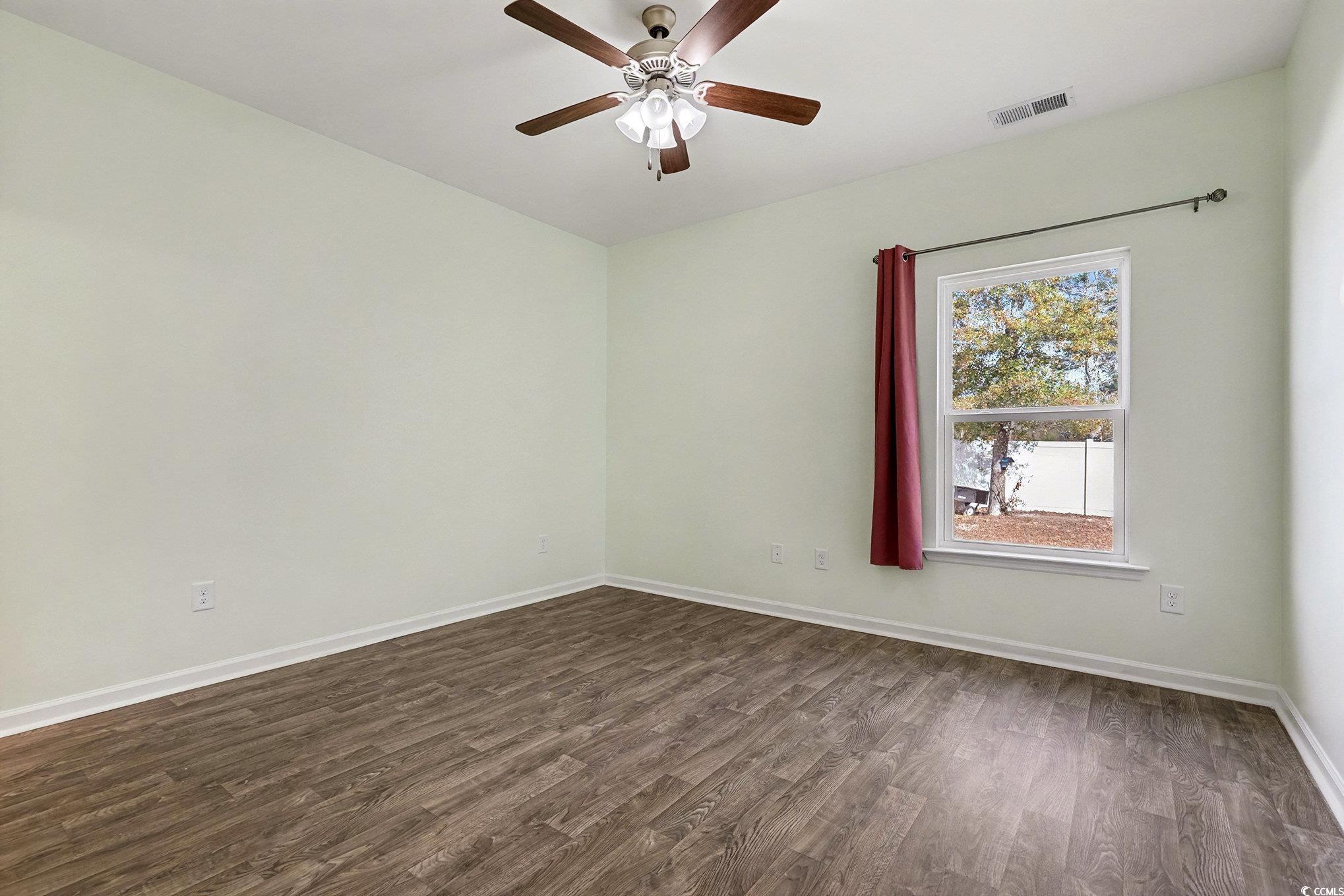 197 Springtide Drive Conway, SC 29527 - Photo 11 of 21 Bathroom with shower / bath combination, vanity, and light tile patterned flooring