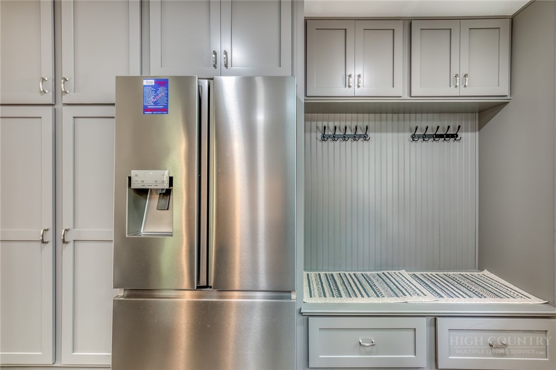 174 Spruce Pine Road Newland, NC 28657 - Photo 9 of 50 a view of kitchen with refrigerator and cabinets