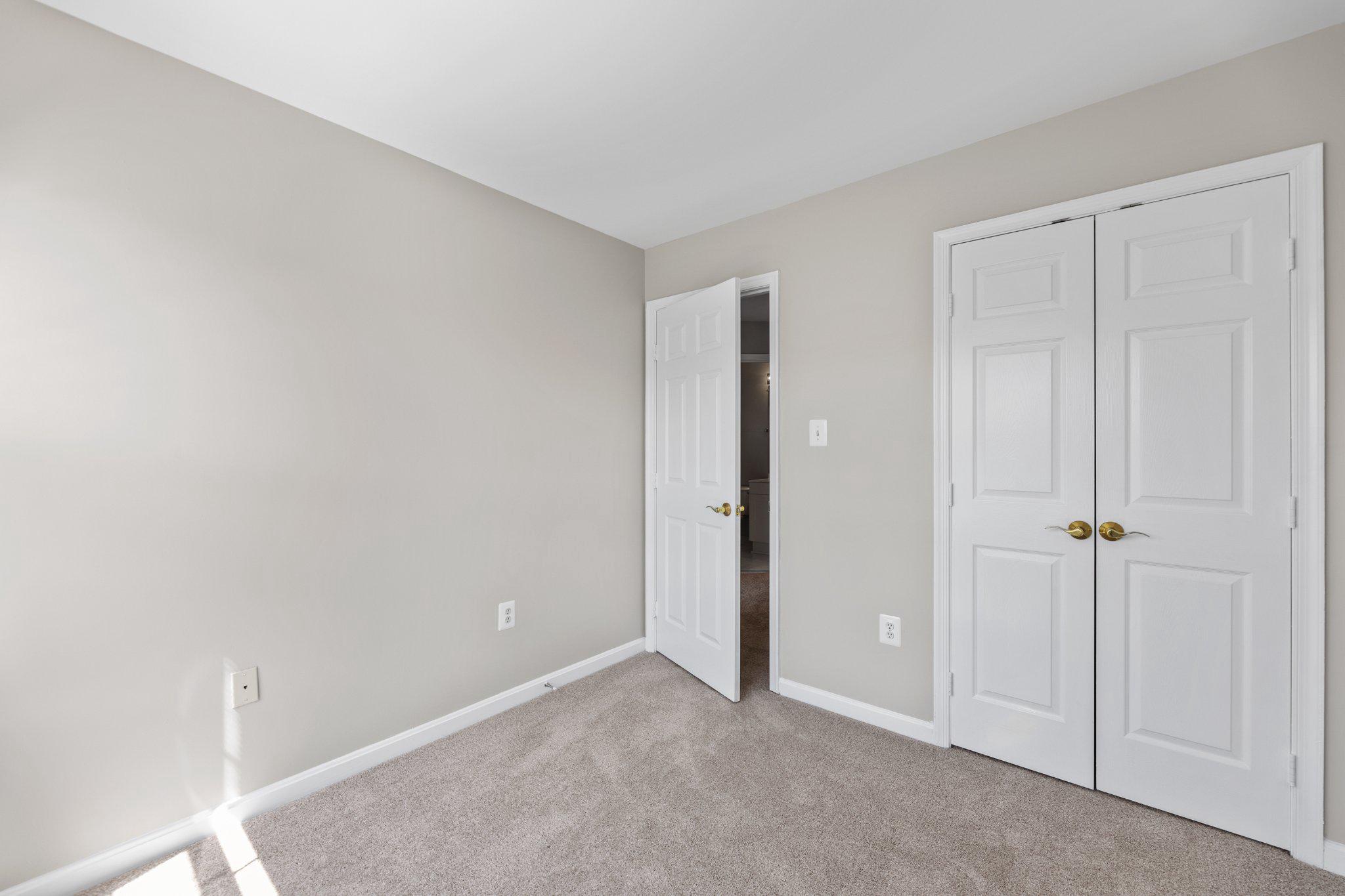 9241 Lorton Valley Road Lorton, VA 22079 - Photo 33 of 45 Fresh painted Bedroom 3 with double door closet.