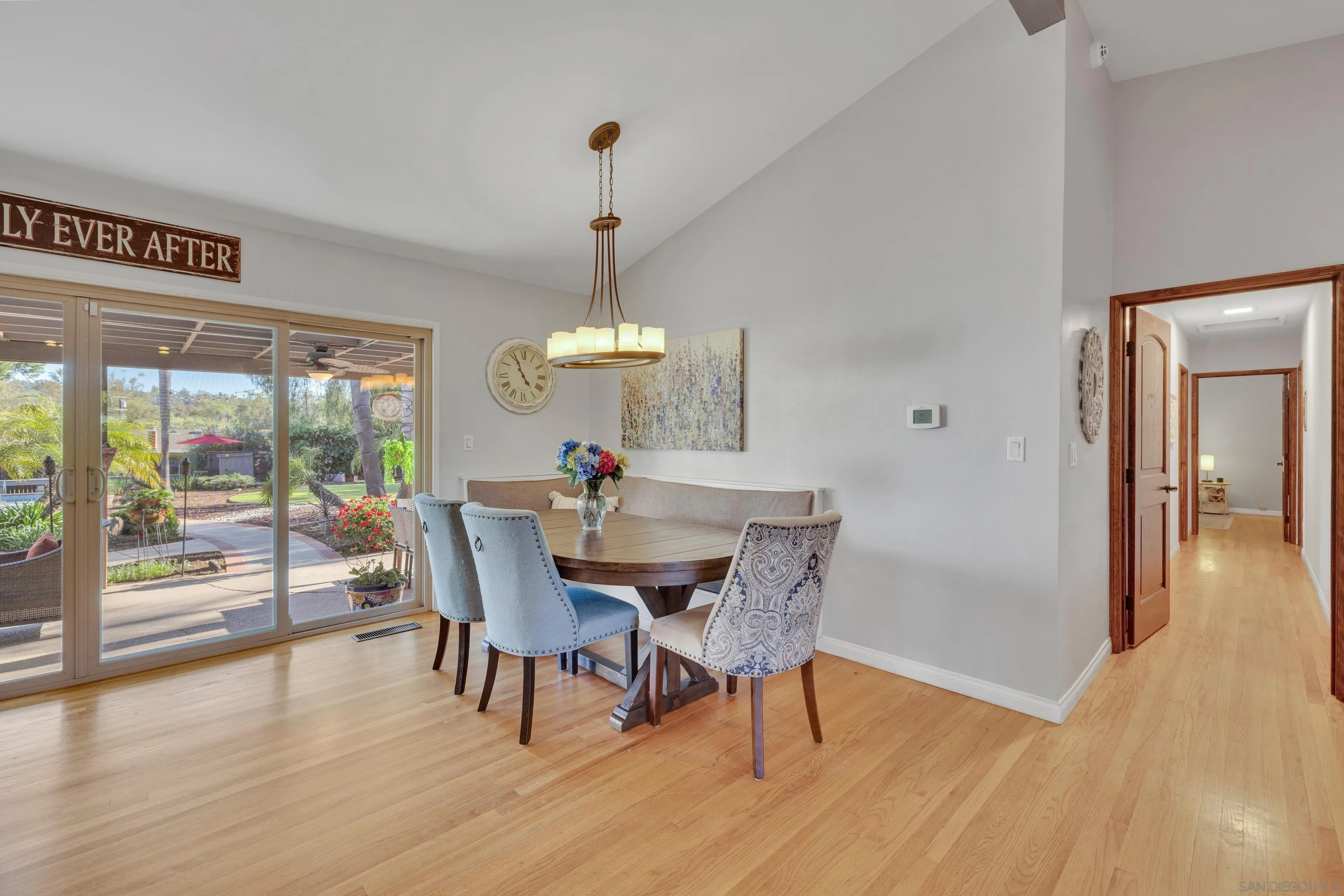 16548 Espola Road Poway, CA 92064 - Photo 13 of 70 a view of a dining room with furniture window and wooden floor
