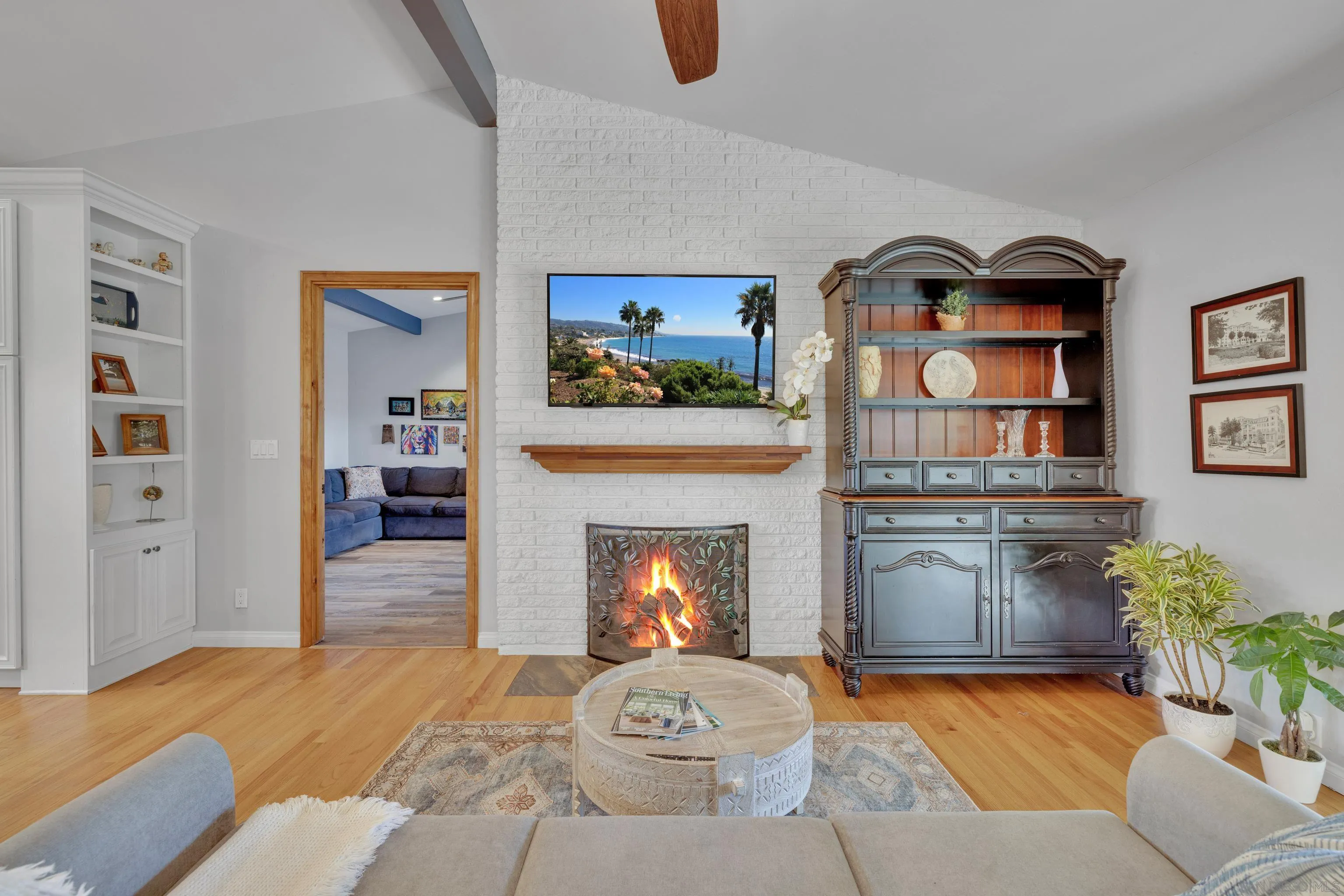 16548 Espola Road Poway, CA 92064 - Photo 14 of 70 a living room with furniture and a fireplace