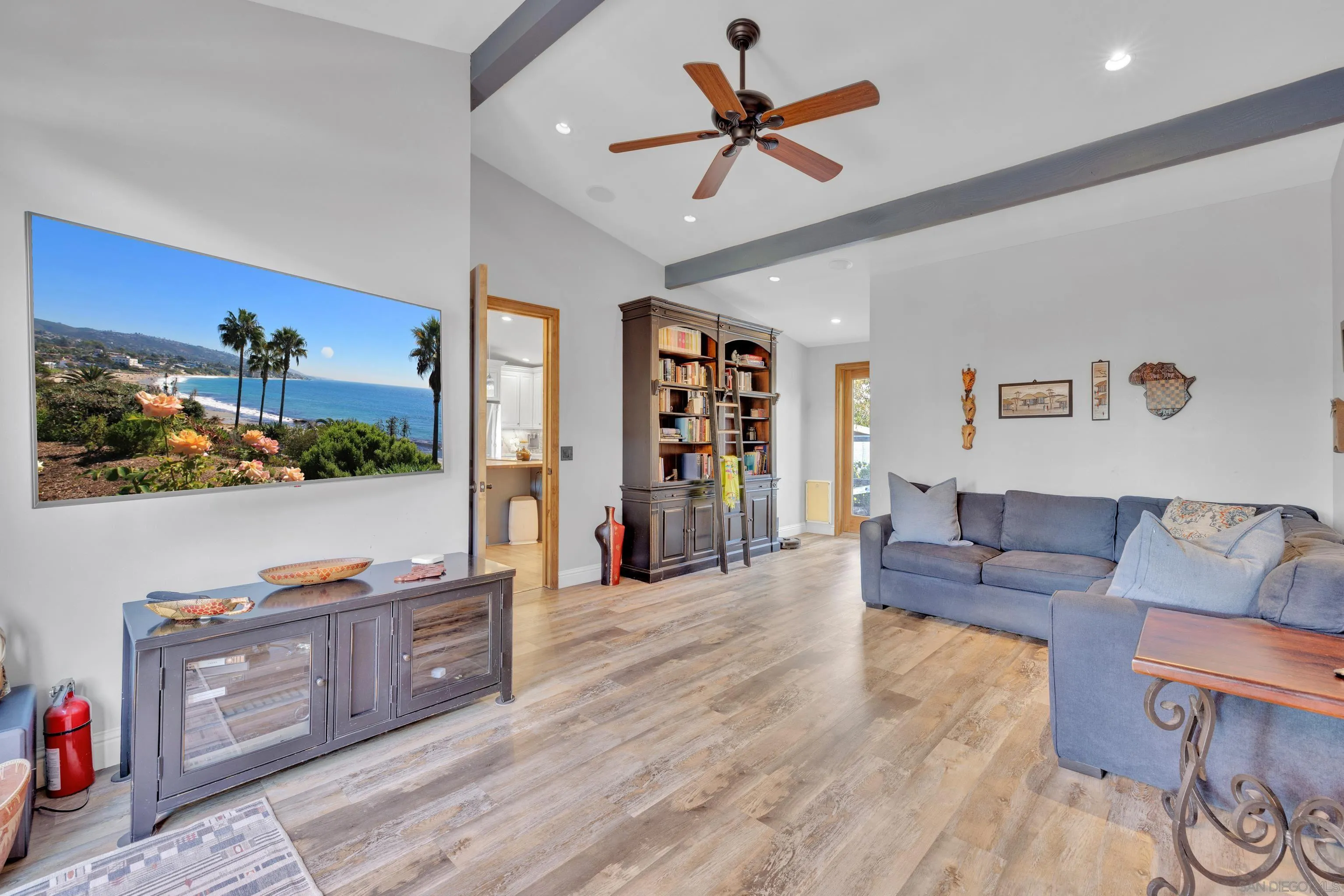 16548 Espola Road Poway, CA 92064 - Photo 15 of 70 a living room with furniture and a flat screen tv