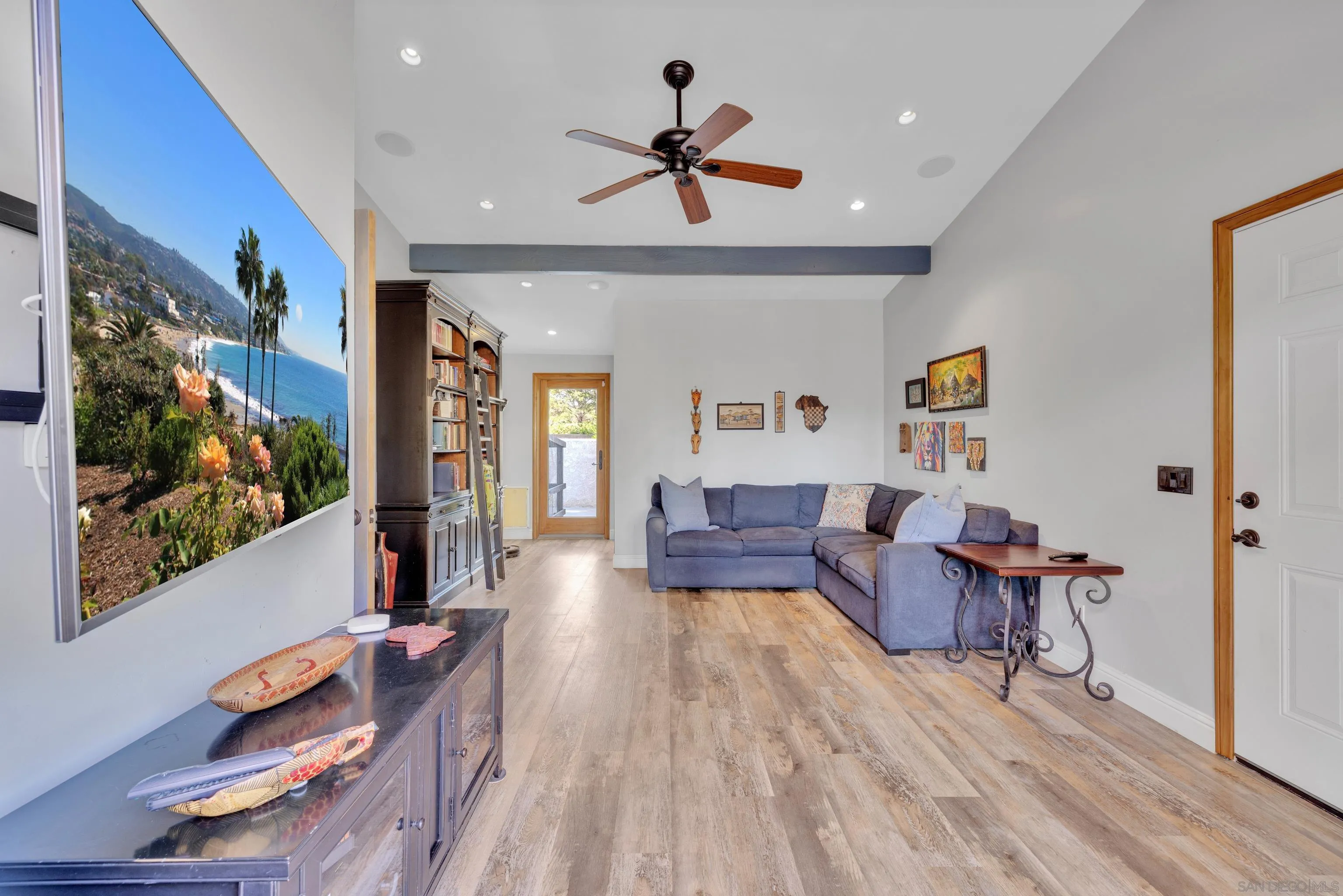 16548 Espola Road Poway, CA 92064 - Photo 16 of 70 a living room with furniture and wooden floor
