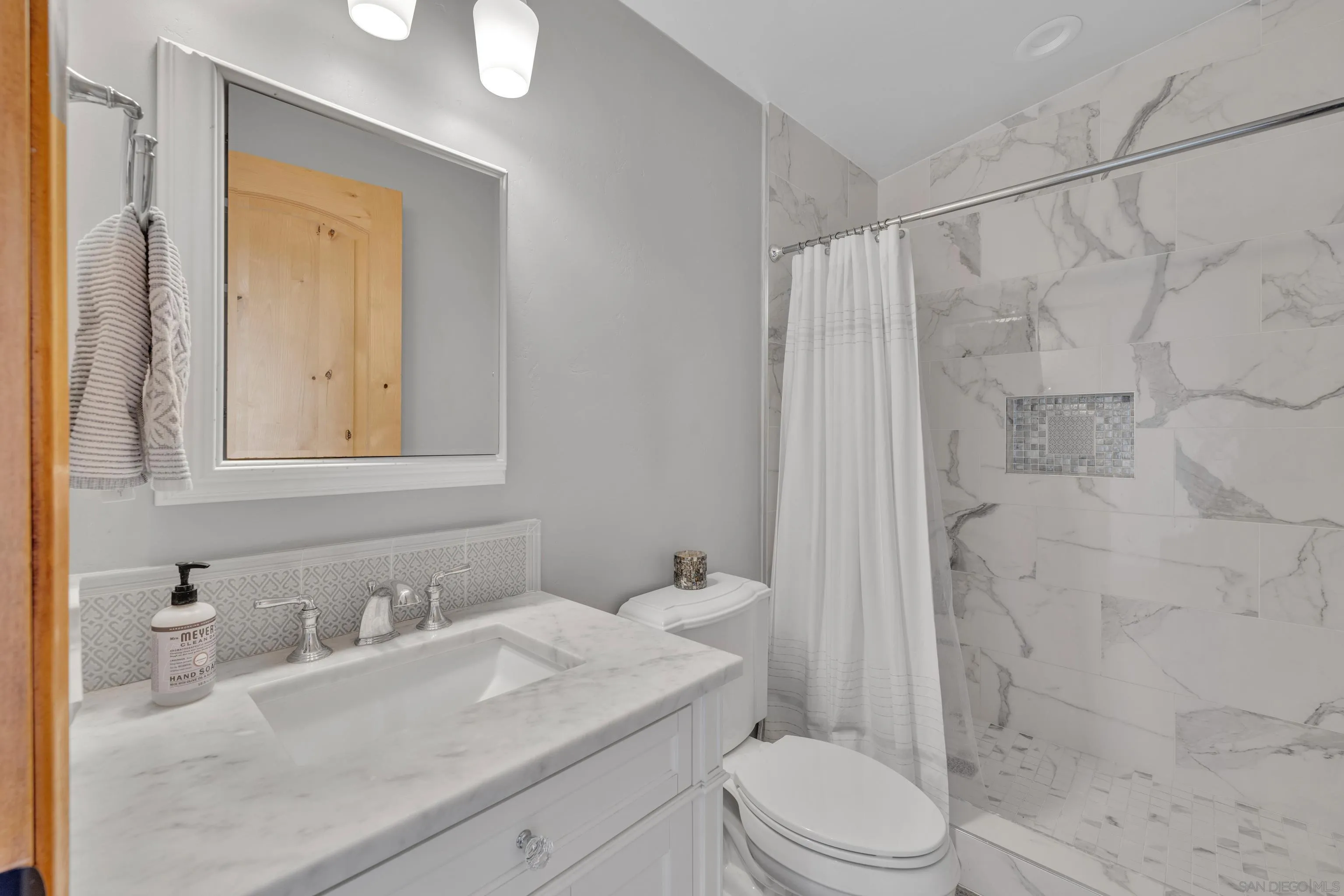 16548 Espola Road Poway, CA 92064 - Photo 18 of 70 a bathroom with a sink vanity granite toilet and shower