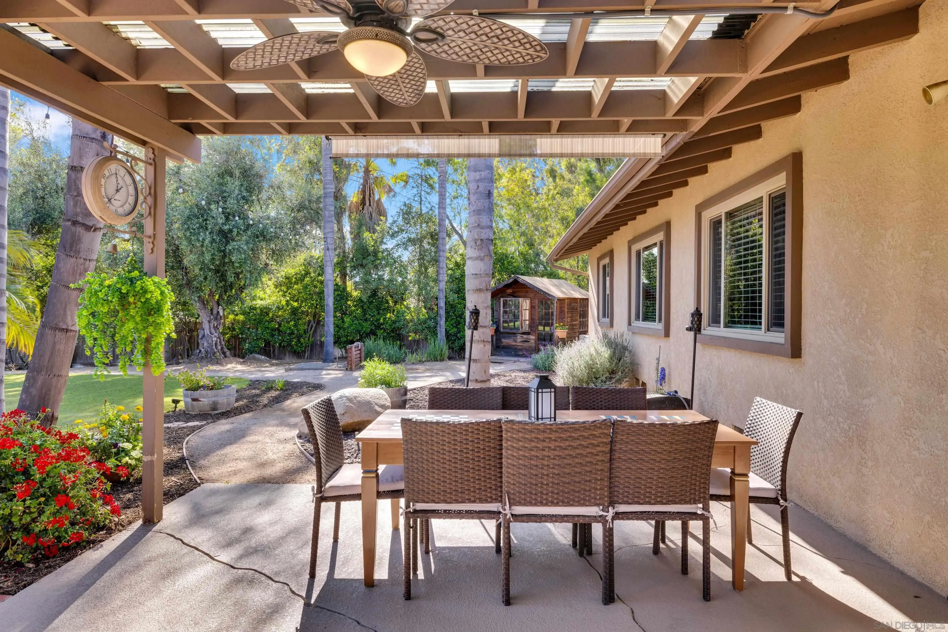 16548 Espola Road Poway, CA 92064 - Photo 47 of 70 a dining room with furniture and garden view