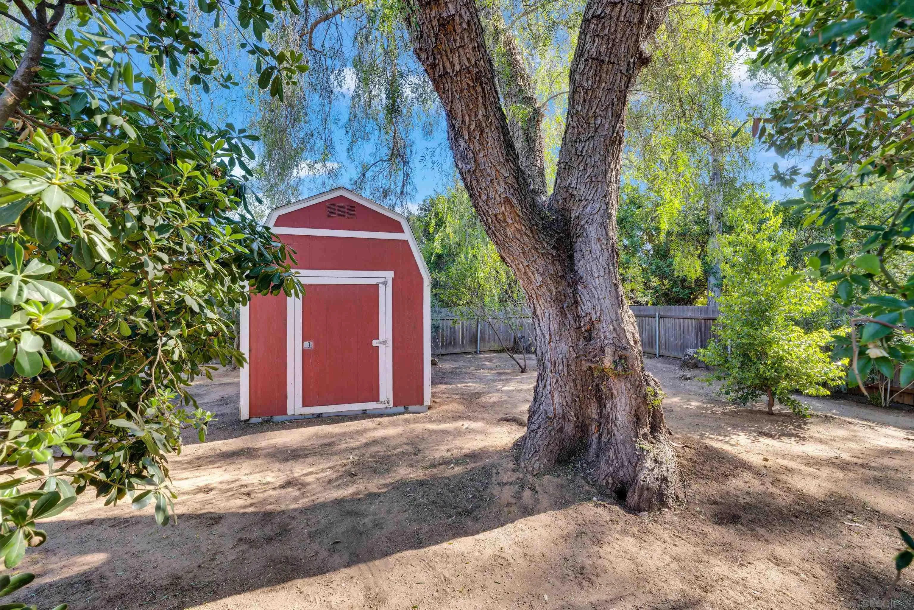 16548 Espola Road Poway, CA 92064 - Photo 54 of 70 a pathway of a house with a trees