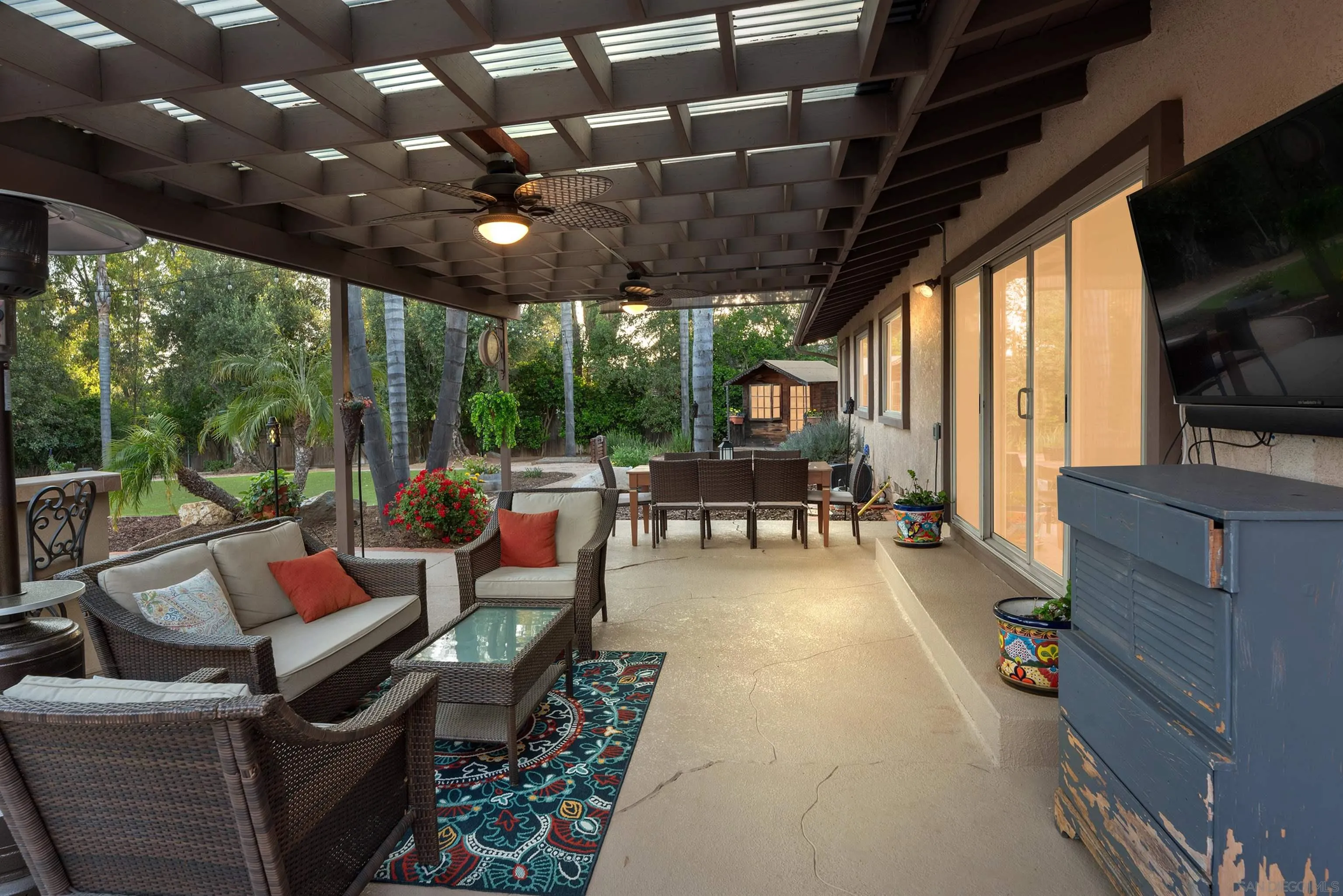 16548 Espola Road Poway, CA 92064 - Photo 61 of 70 a living room with patio furniture and a flat screen tv
