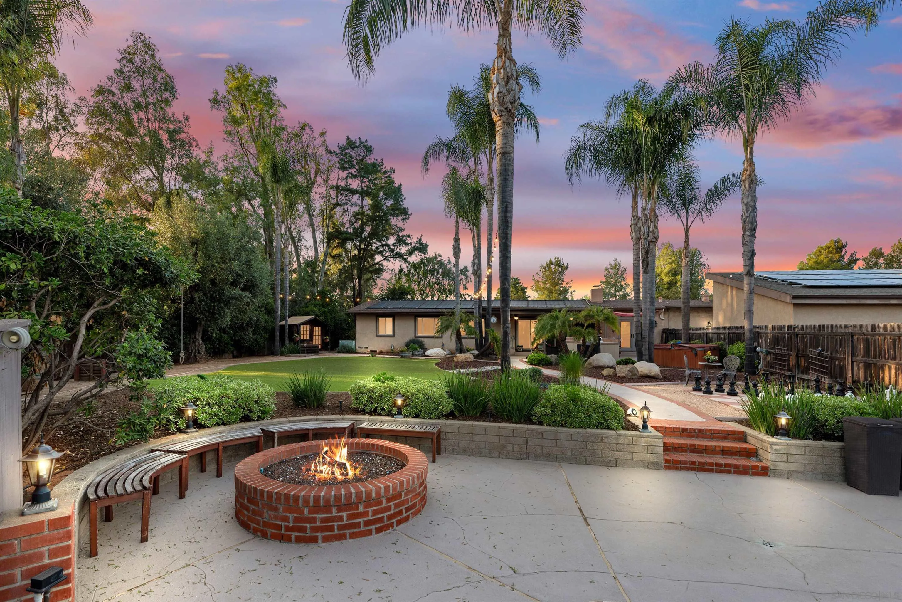 16548 Espola Road Poway, CA 92064 - Photo 68 of 70 a view of a backyard with plants and a patio