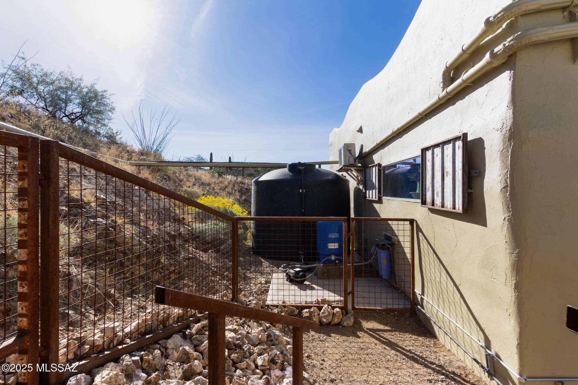 8491 South Pistol Hill Road Vail, AZ 85641 - Photo 37 of 50 3000 gallon water havesting tank!
