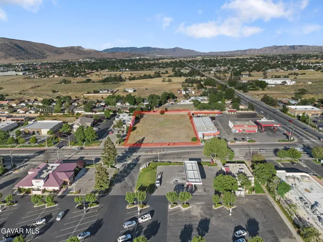 an aerial view of residential building and lake