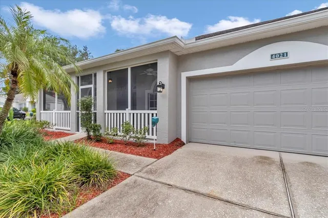 front view of a house with a small yard