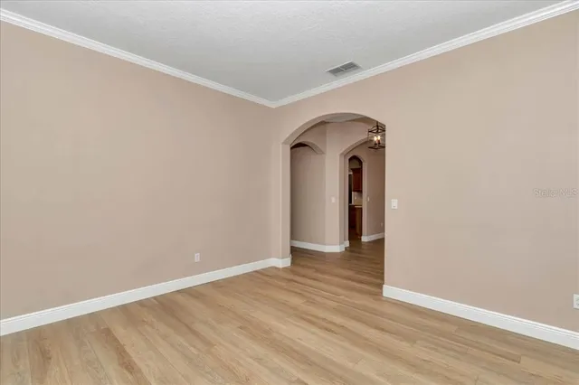a view of a livingroom with wooden floor