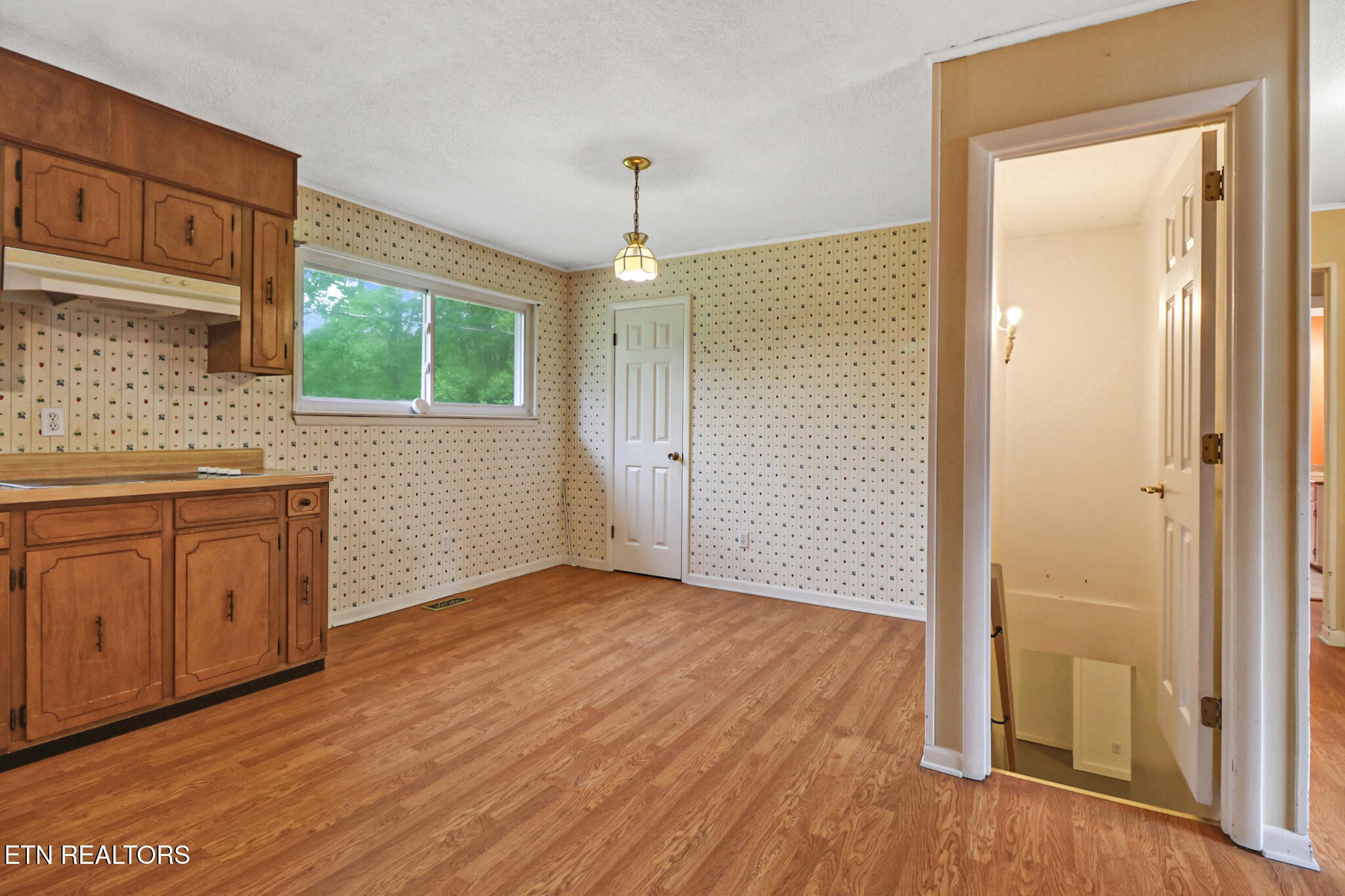 148 Porter Lane Spring City, TN 37381 - Photo 11 of 55 wooden floor in an empty room with a window