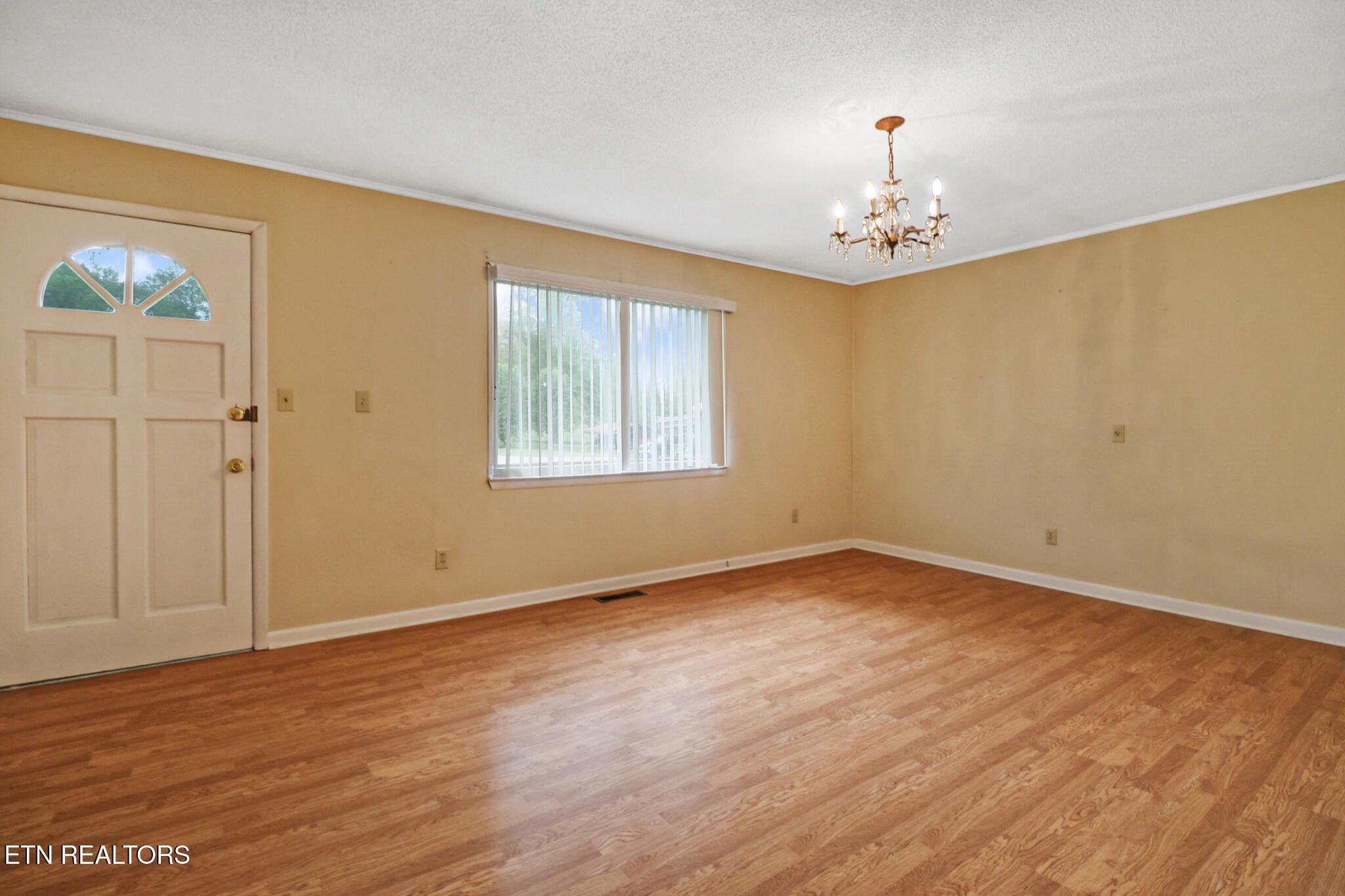 148 Porter Lane Spring City, TN 37381 - Photo 12 of 55 a view of an empty room with a window