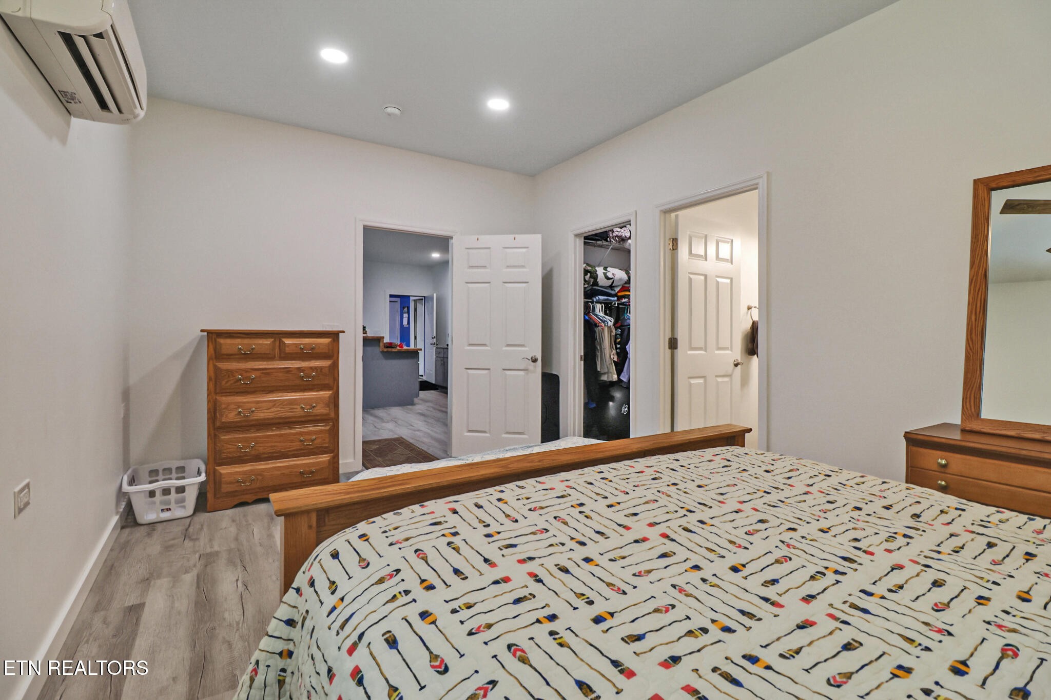 148 Porter Lane Spring City, TN 37381 - Photo 42 of 55 a bedroom with a bed and a dresser