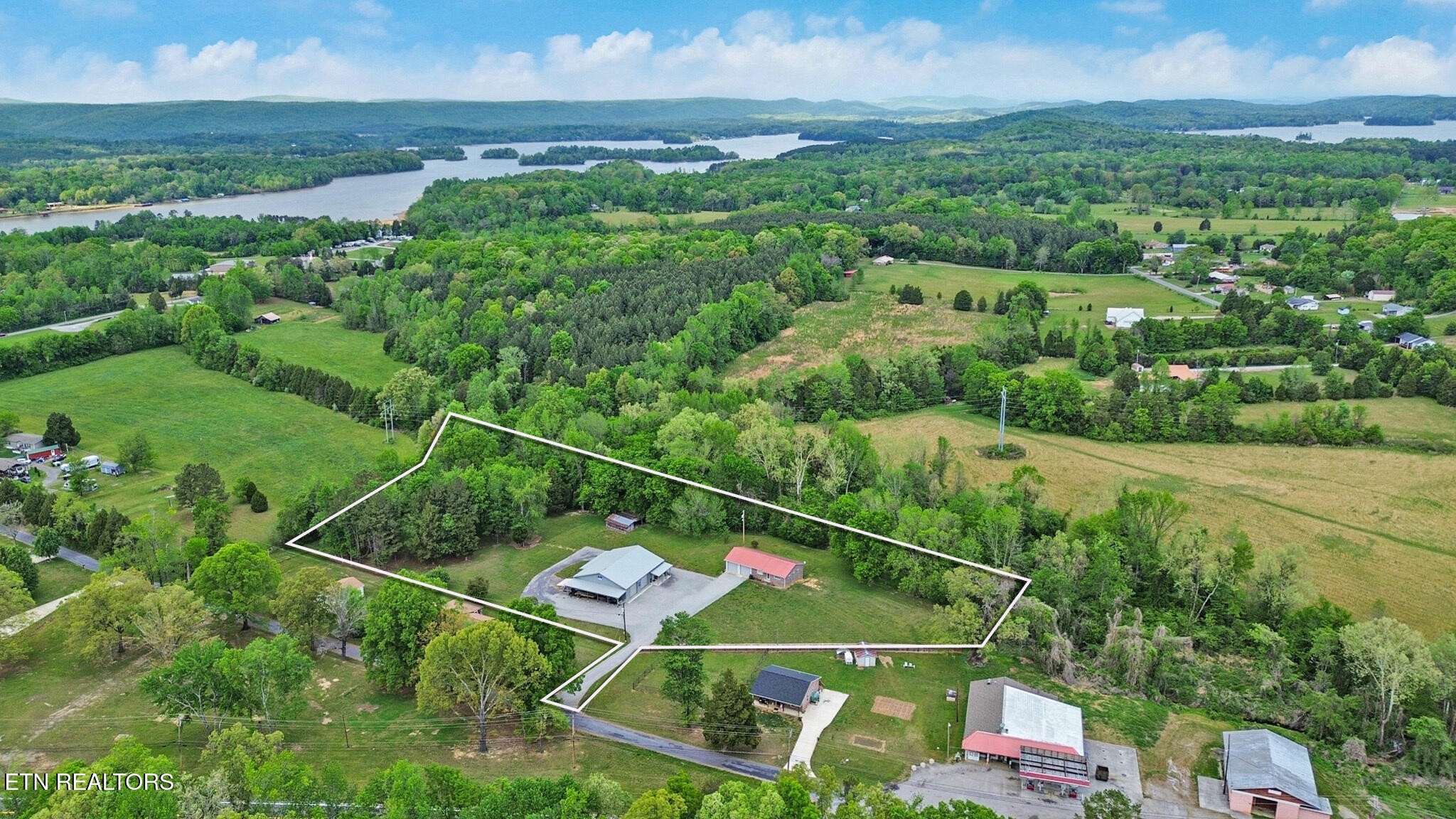 148 Porter Lane Spring City, TN 37381 - Photo 51 of 55 an aerial view of residential house with outdoor space and mountain view in back