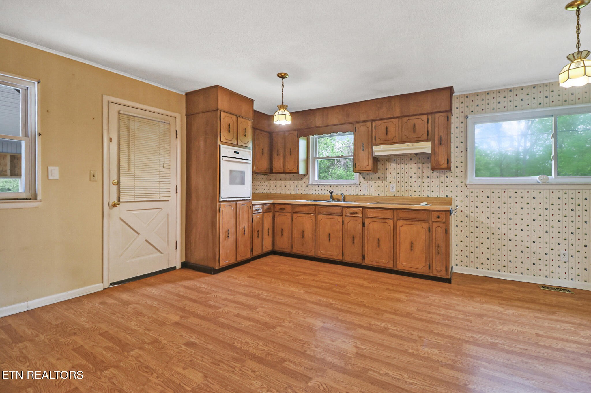 148 Porter Lane Spring City, TN 37381 - Photo 10 of 55 a view of a kitchen with a sink and cabinets