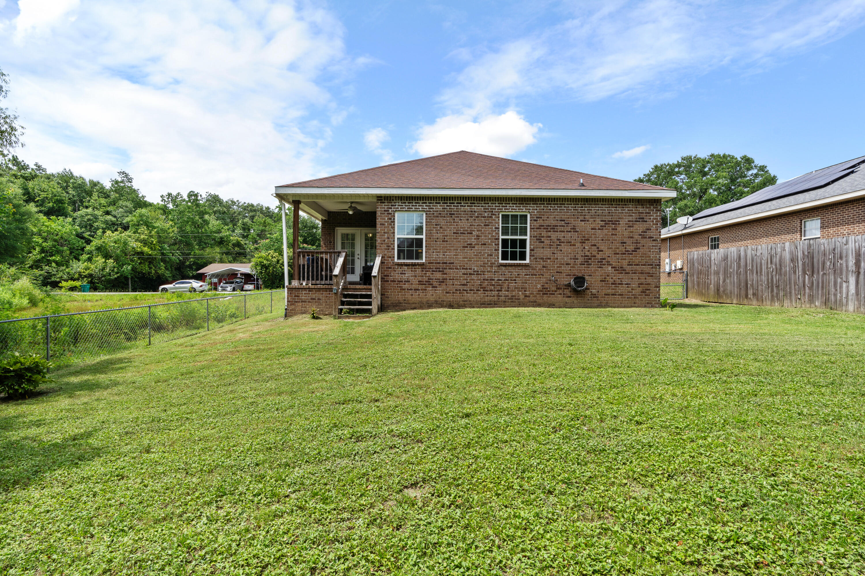 2920 Patch Avenue Crestview, FL 32539 - Photo 23 of 45 a front view of house with yard and green space