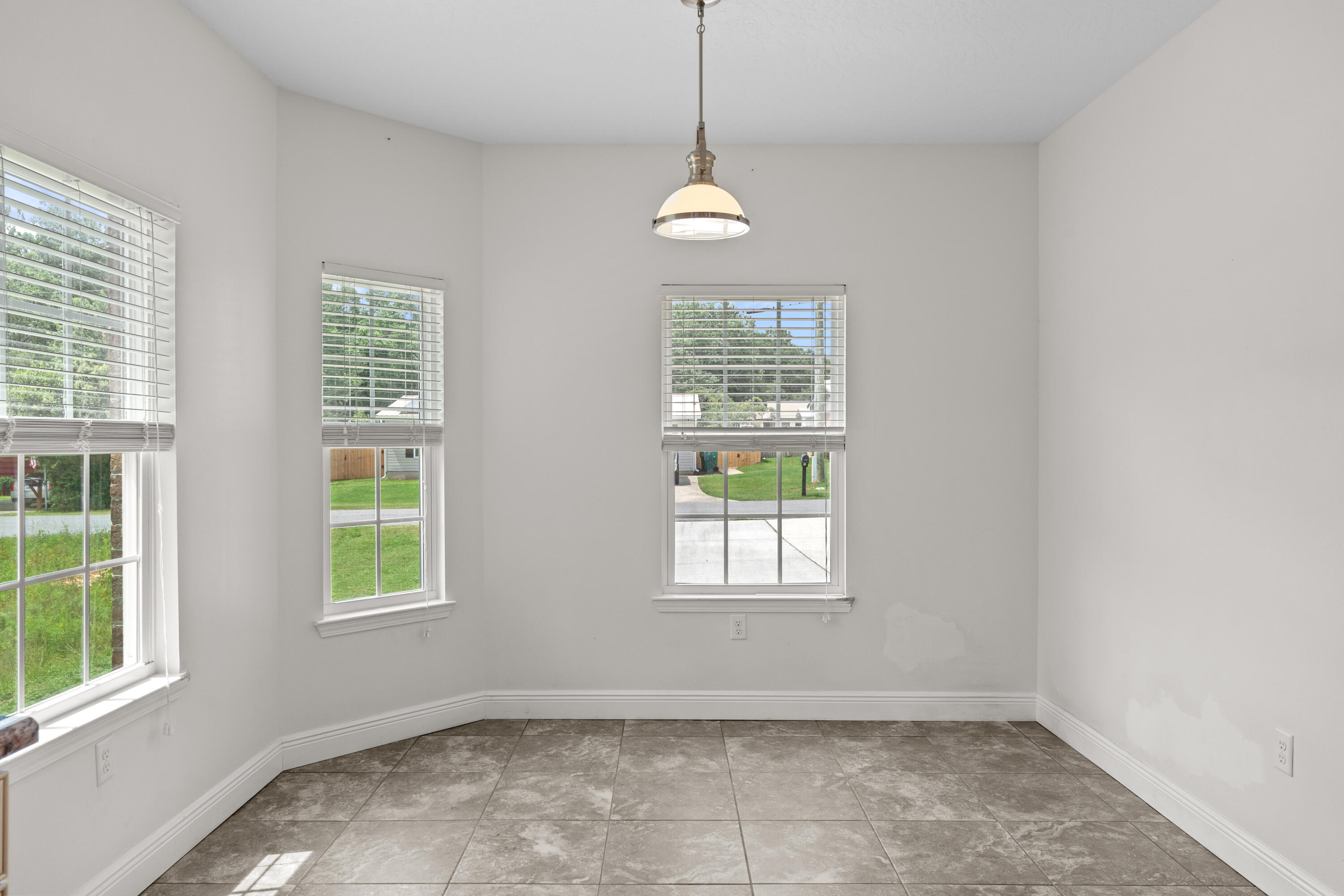 2920 Patch Avenue Crestview, FL 32539 - Photo 5 of 45 an empty room with windows and closet