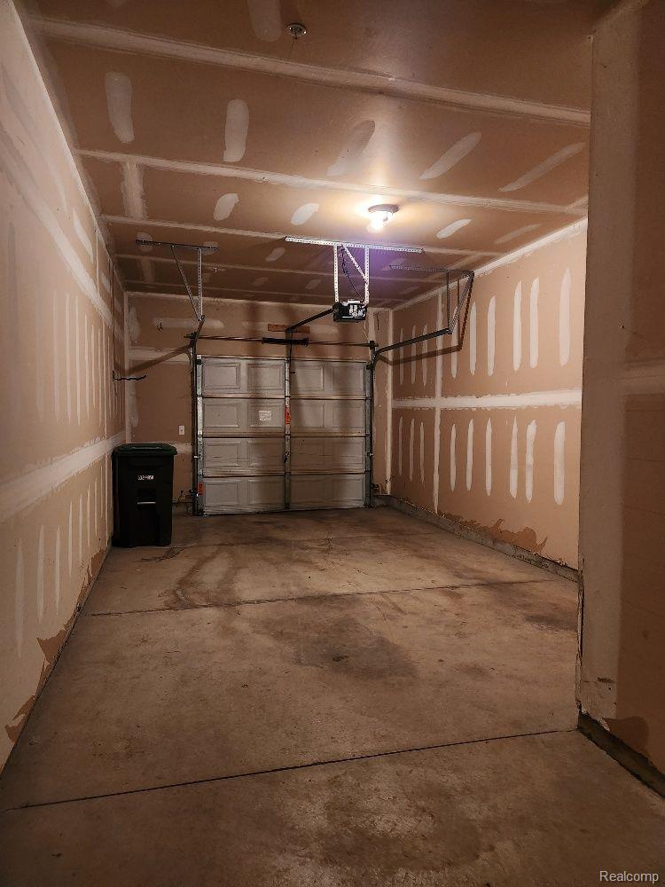 23436 Ridgeview Street, Unit 4 Taylor, MI 48180 - Photo 25 of 26 Deep 1 car car garage with storage space