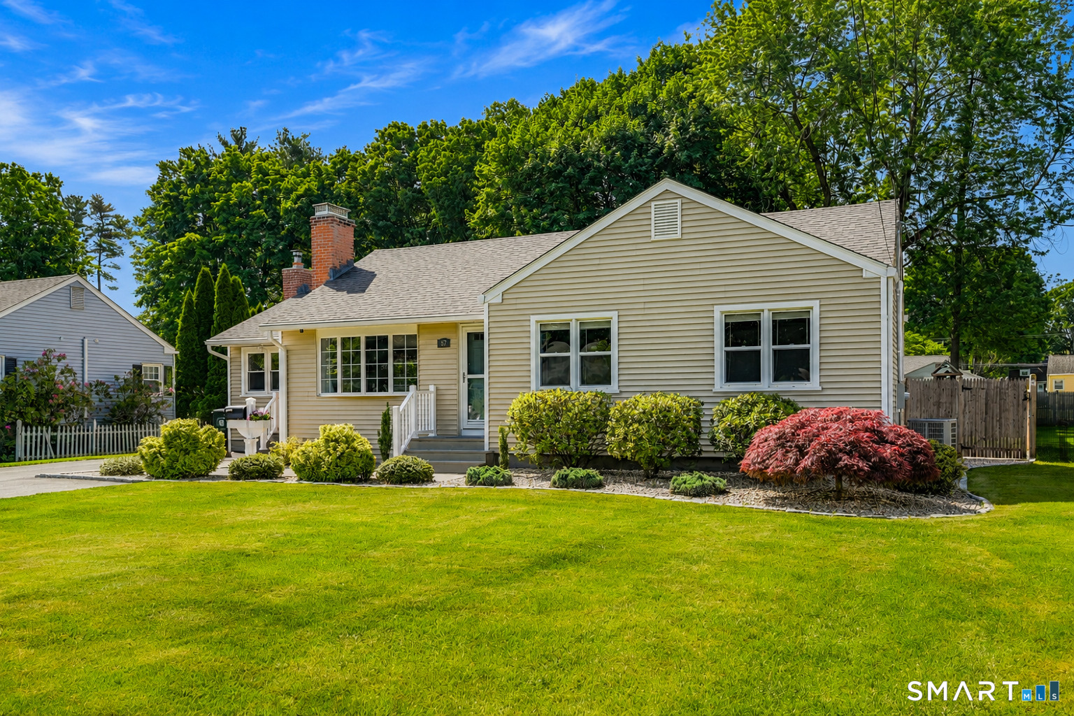 87 Lydall Road Newington, CT 06111 - Photo 1 of 35 a front view of house with yard and green space