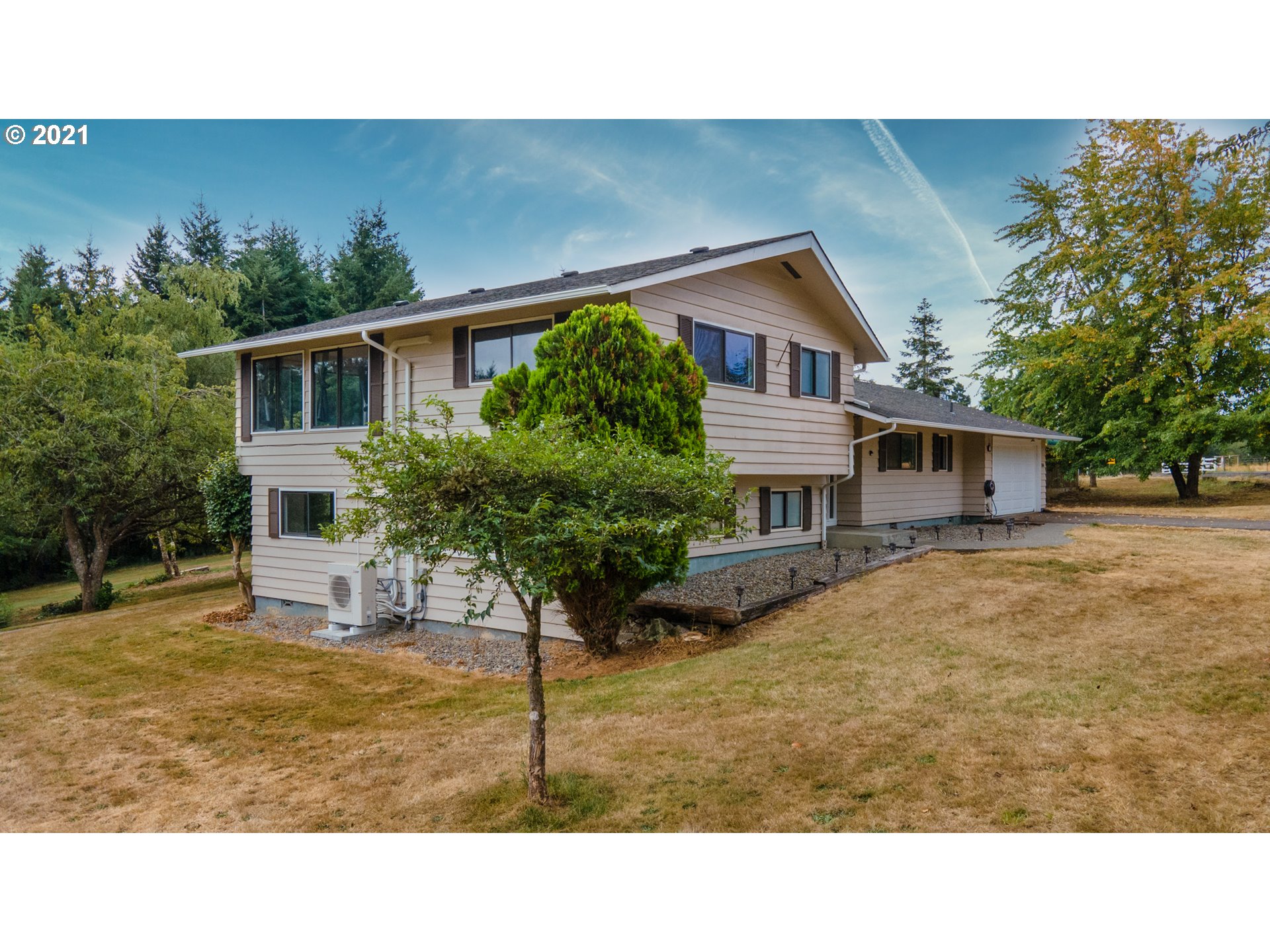 314 Yates Road Chehalis, WA 98532 - Photo 2 of 30 a house view with a backyard space