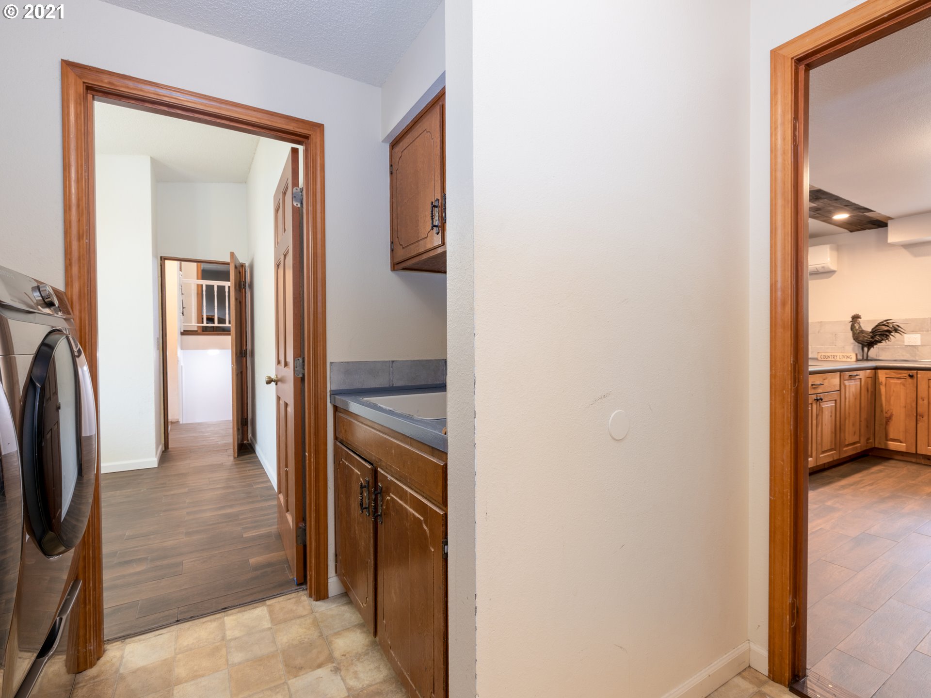 314 Yates Road Chehalis, WA 98532 - Photo 17 of 30 a view of a hallway view with wooden floor and a living room