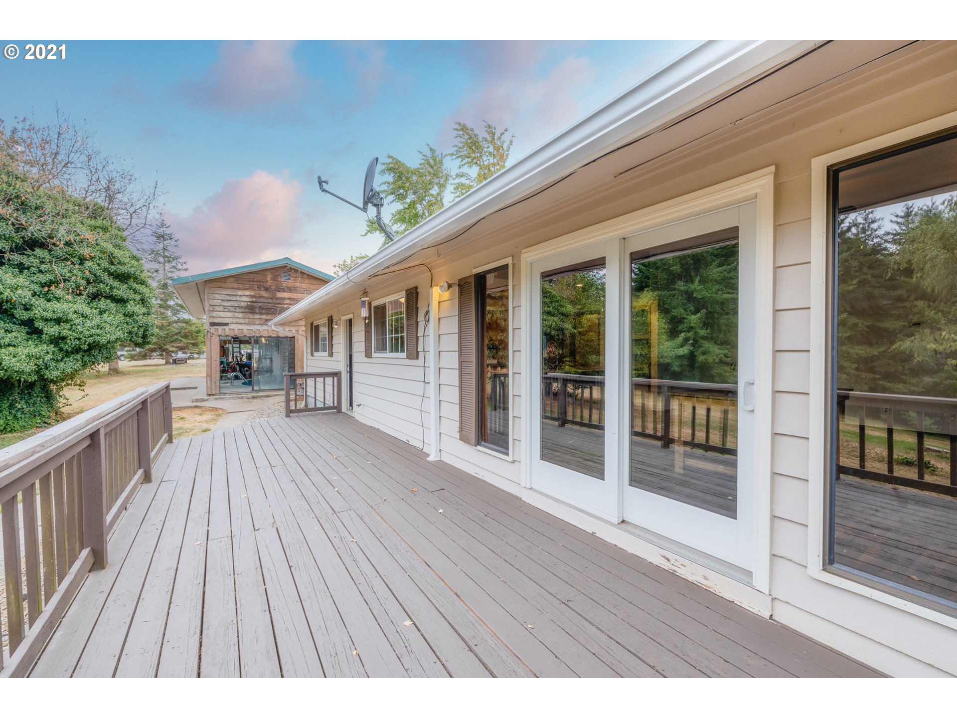314 Yates Road Chehalis, WA 98532 - Photo 23 of 30 a view of backyard with a deck and wooden floor