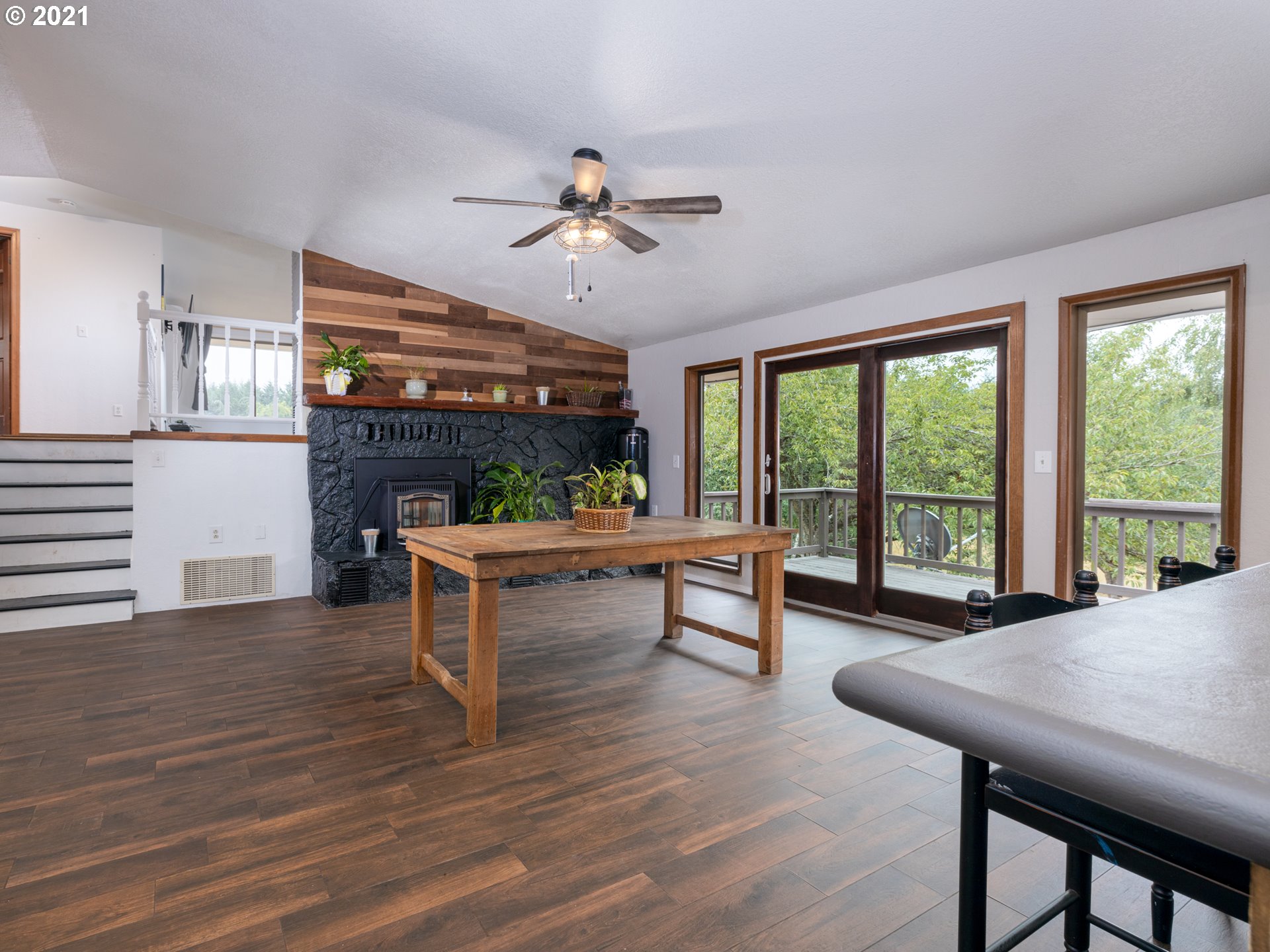 314 Yates Road Chehalis, WA 98532 - Photo 7 of 30 a living room with furniture and a floor to ceiling window