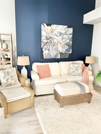 a living room with couches and a couch