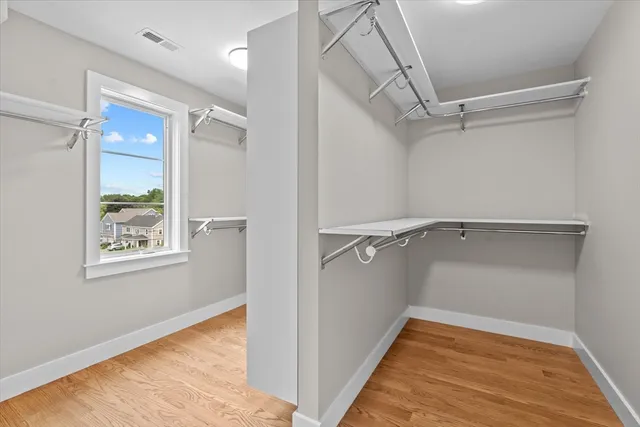 an aerial view of a houses with a yard