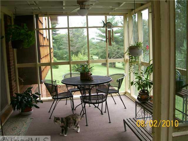 184 Clay Davis Road Dobson, NC 27017 - Photo 9 of 16 Enclosed Porch.